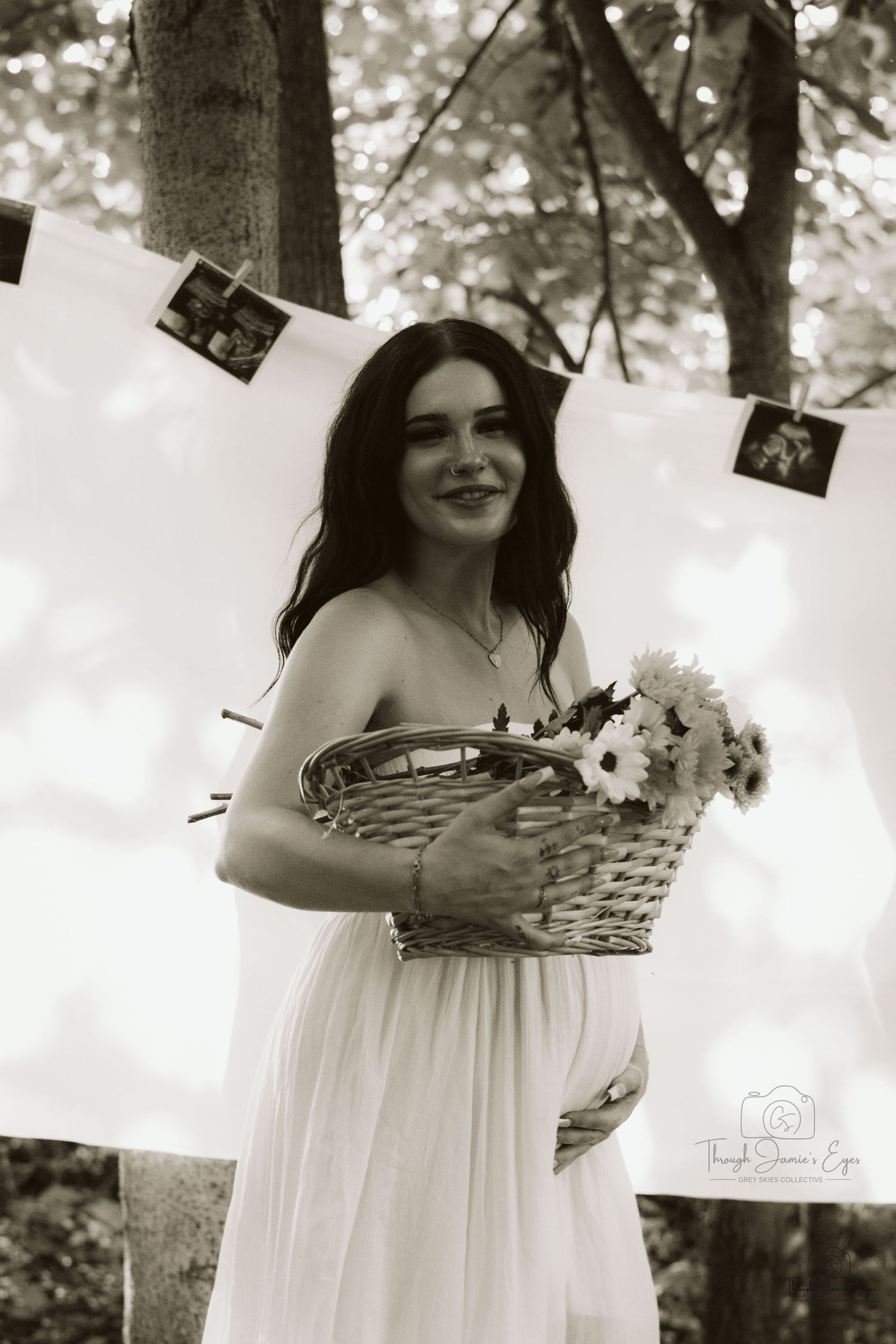 Madeline and Dsean maternity session photography portraits couples grey skies collective albums