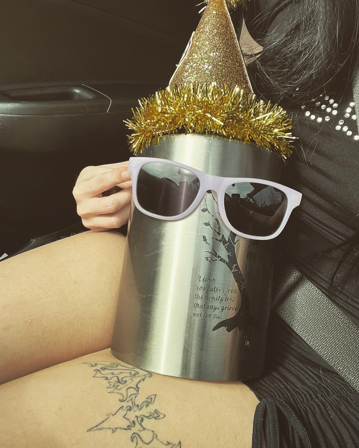 jamie amados urn dressed up on his birthday