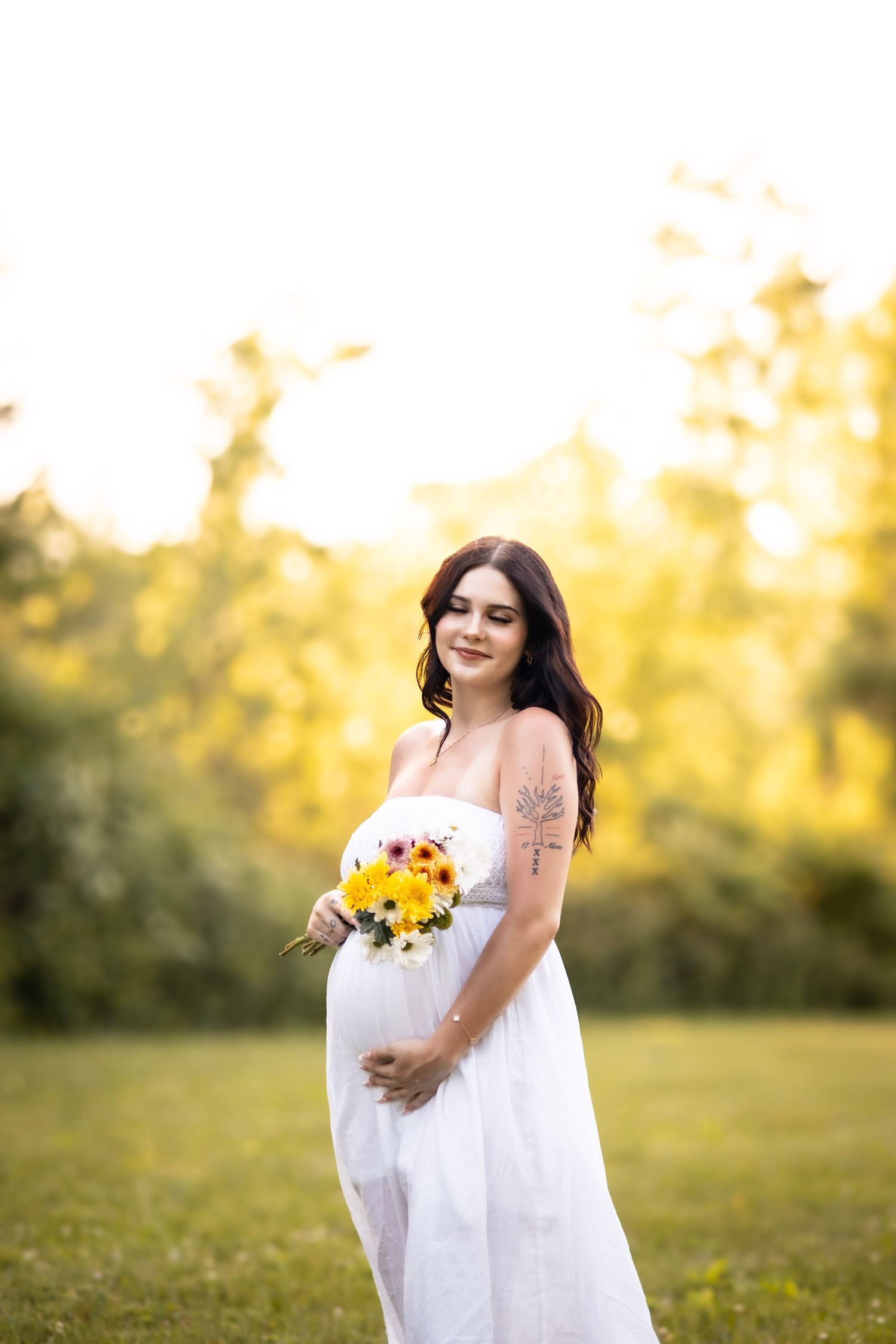 Madeline and Dsean maternity session photography portraits couples grey skies collective albums