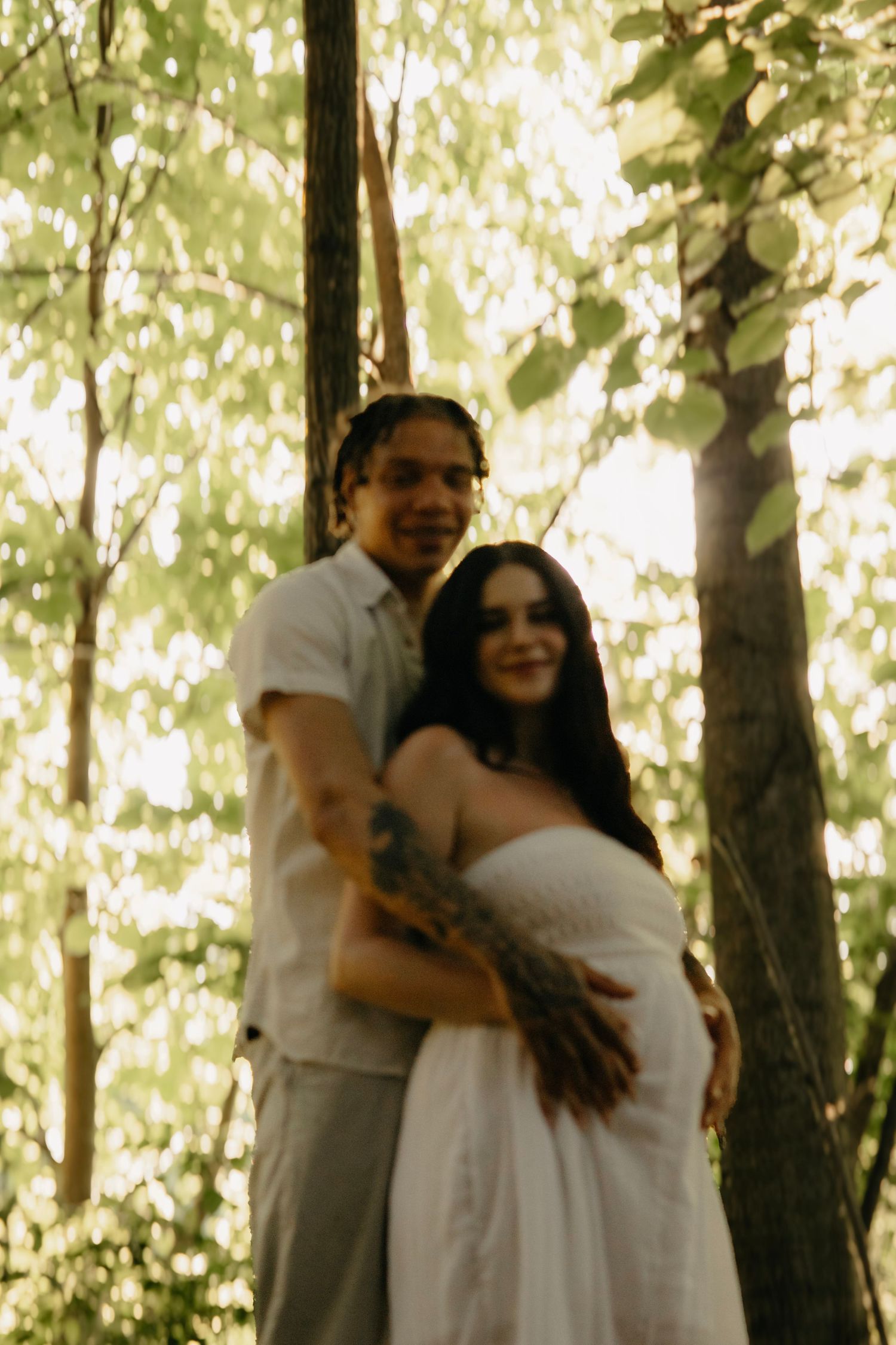 Madeline and Dsean maternity session photography portraits couples grey skies collective albums