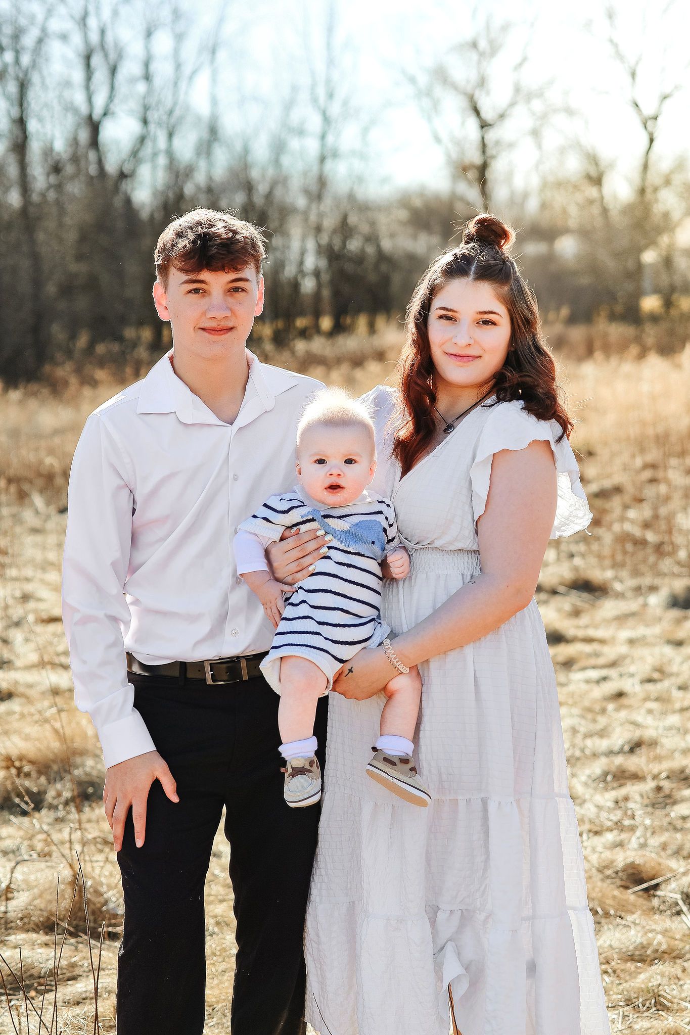 owner Julianna amado and her son Adrian Grey family sessions grey skies collective with fiancé Aiden