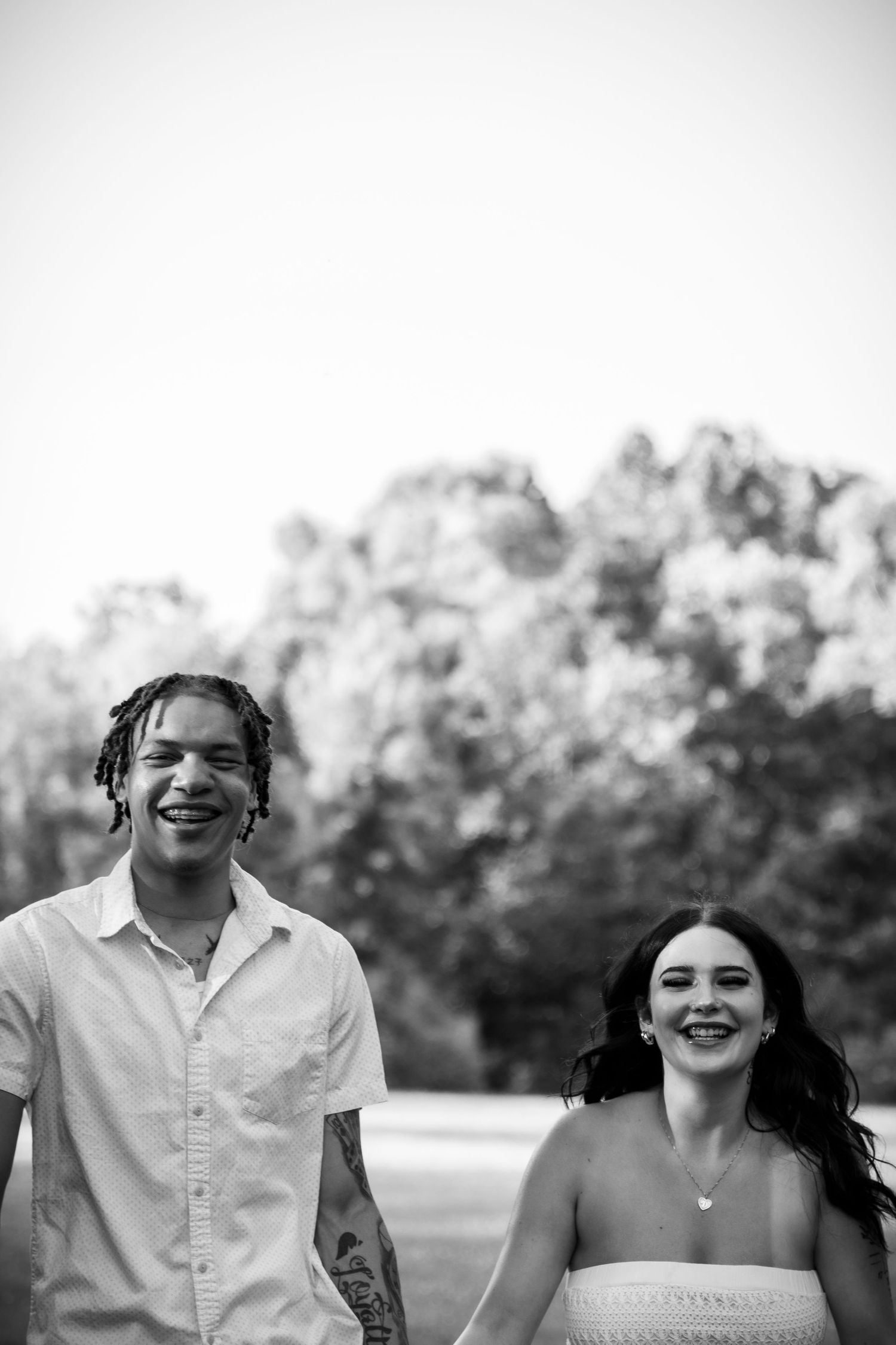 Madeline and Dsean maternity session photography portraits couples grey skies collective albums