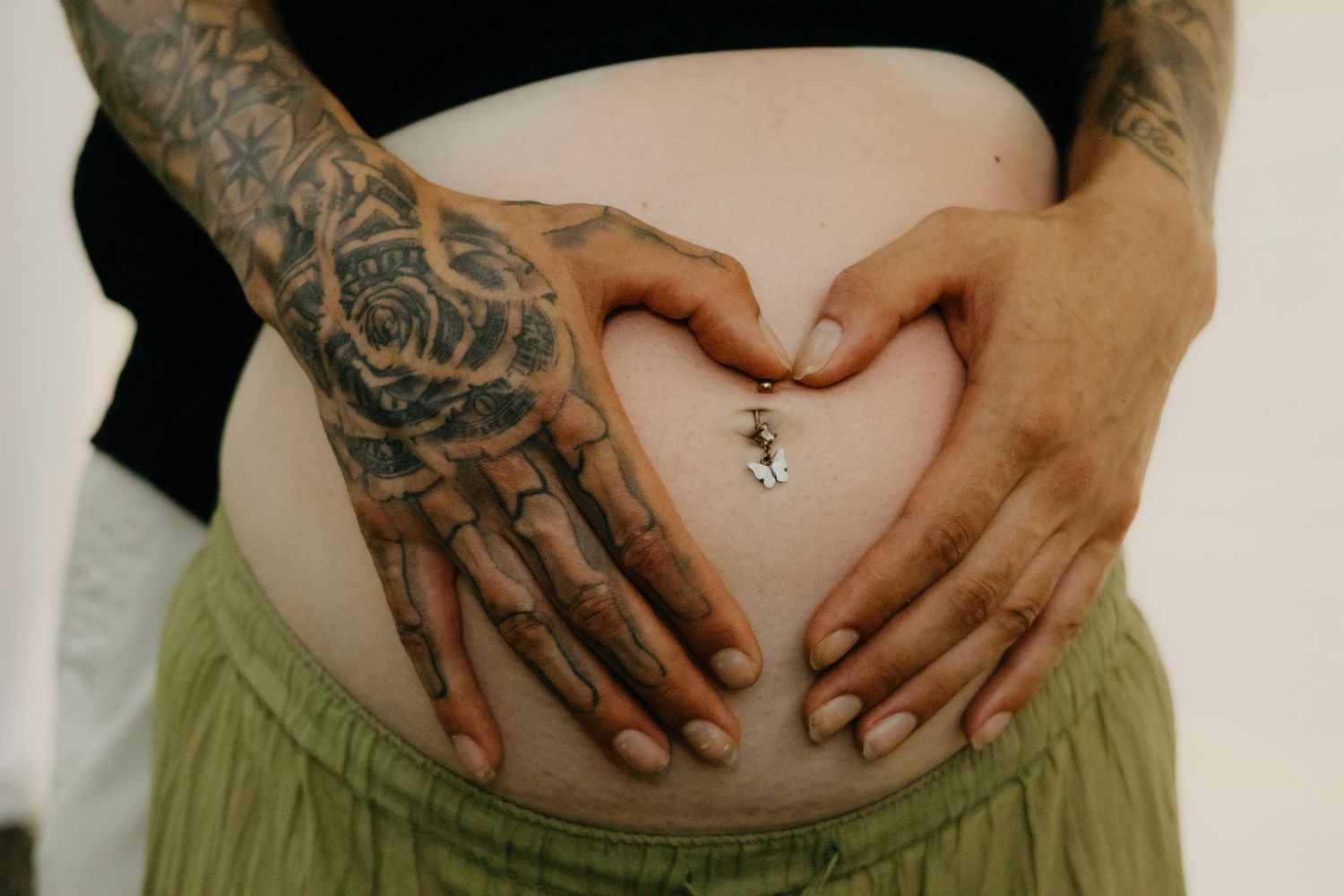 Madeline and Dsean maternity session photography portraits couples grey skies collective albums