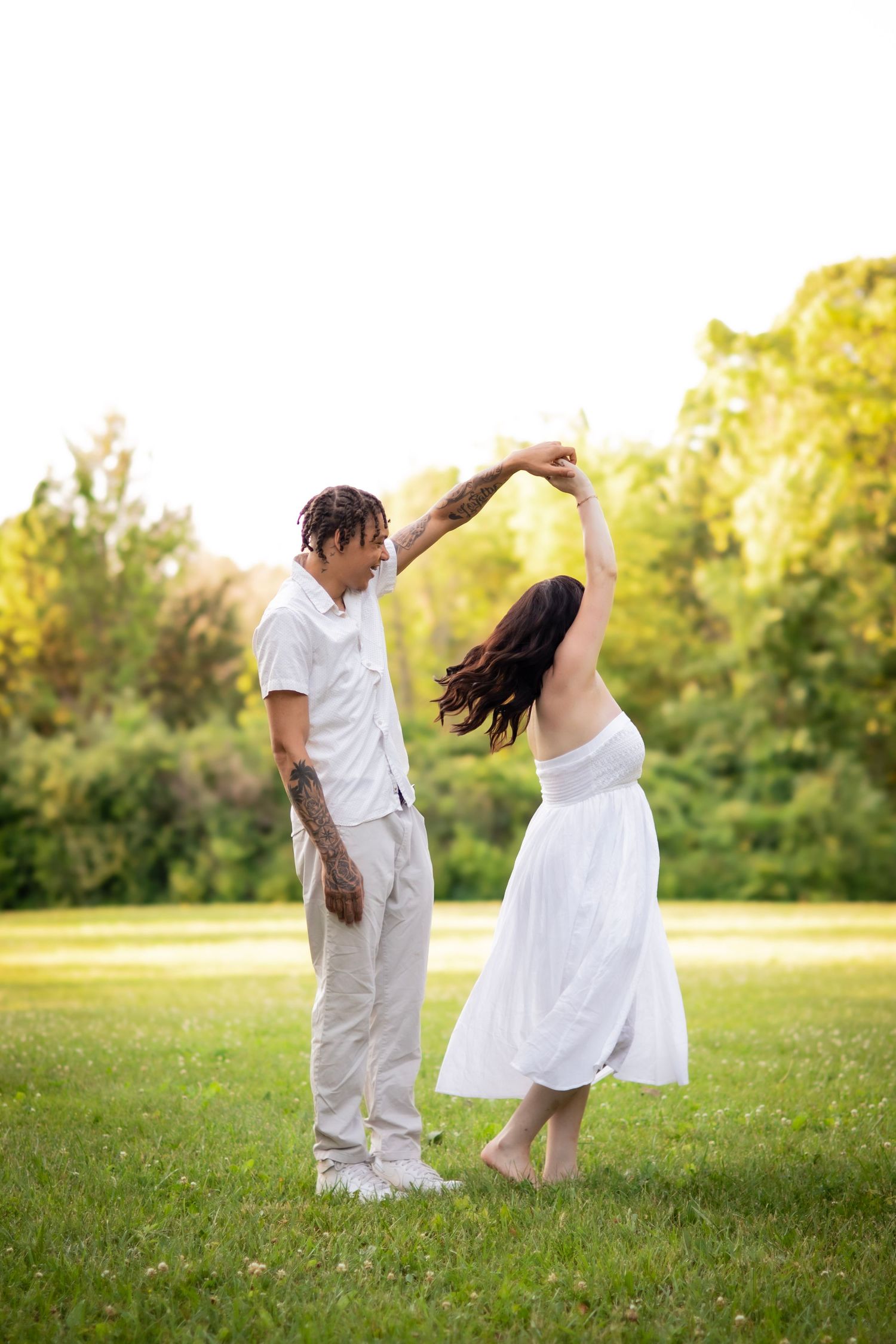 Madeline and Dsean maternity session photography portraits couples grey skies collective albums