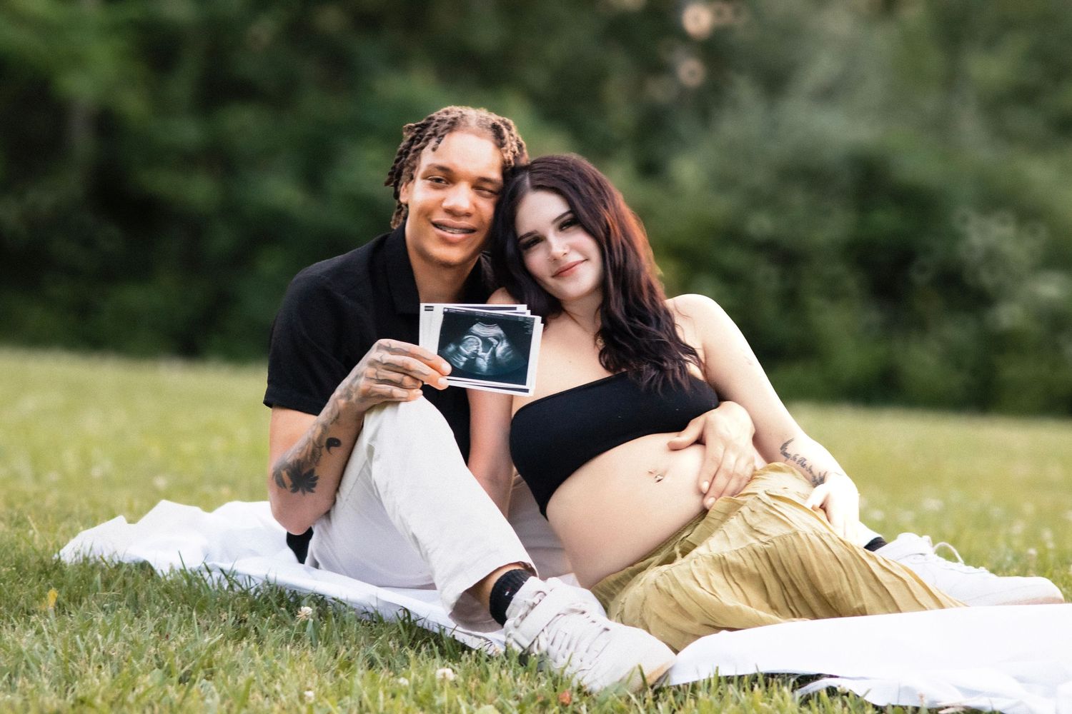 Madeline and Dsean maternity session photography portraits couples grey skies collective albums
