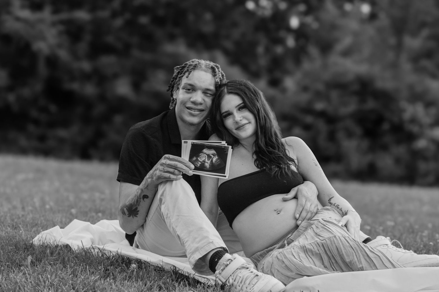 Madeline and Dsean maternity session photography portraits couples grey skies collective albums
