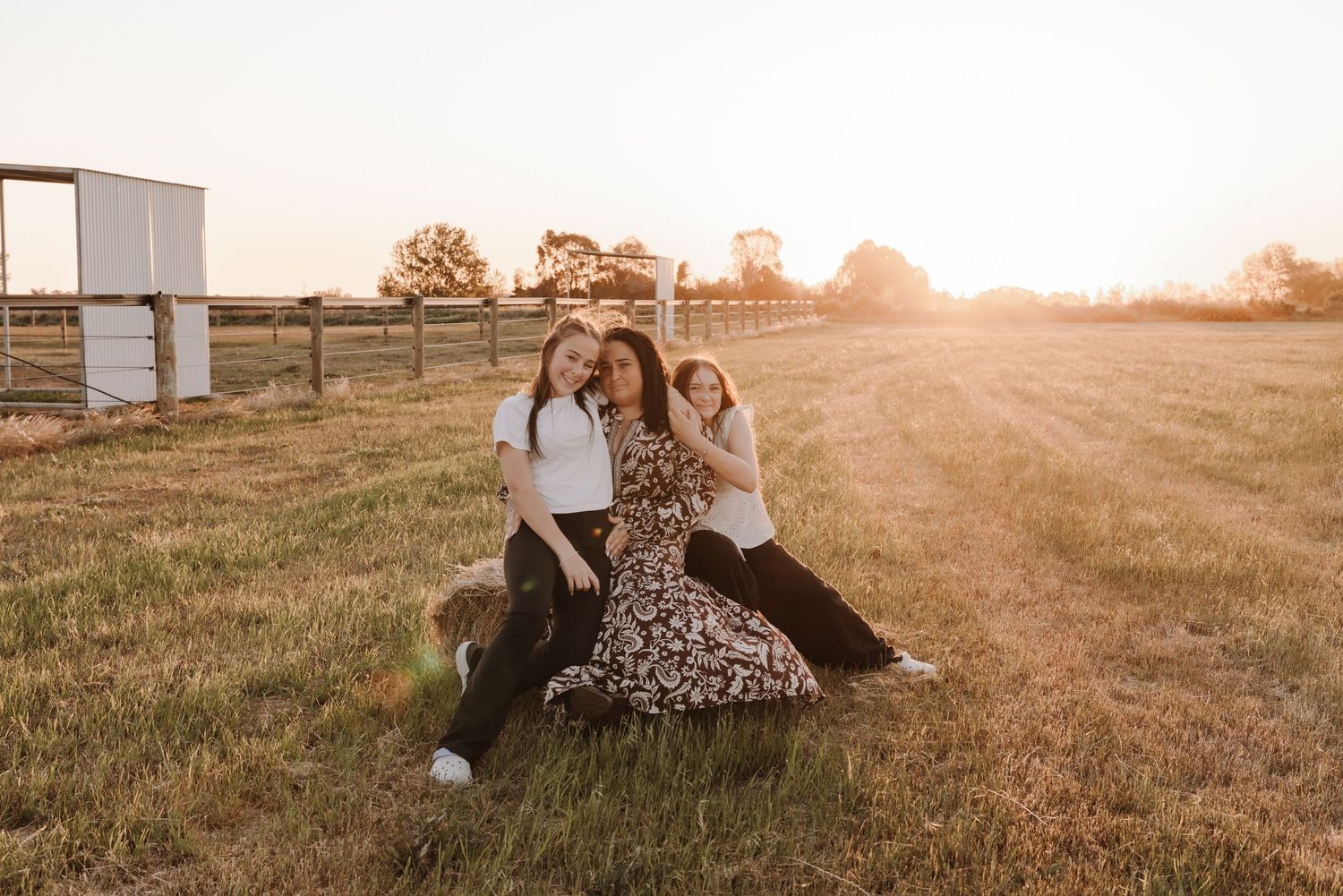family-playing-in-field-during-golden-hour-tongala