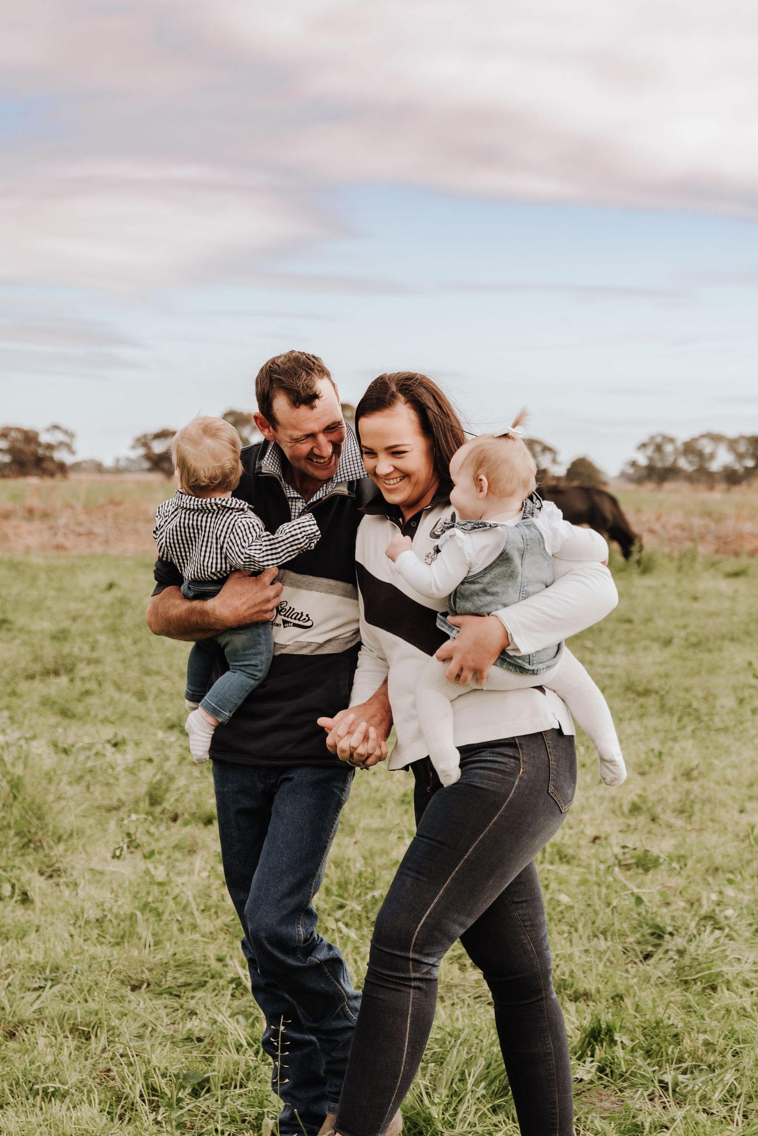 family-playing-in-field-during-golden-hour-tongala