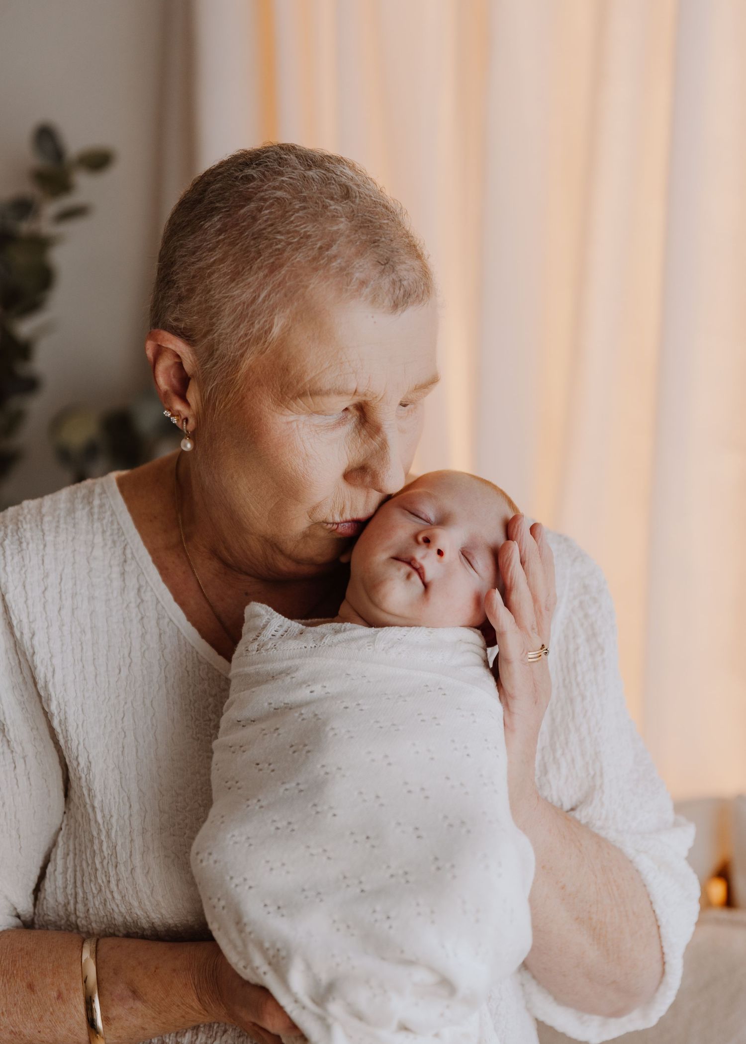 tongala-newborn-photography-newborn-baby-with-nan-wrapped-in-neutral-blanket-tongala