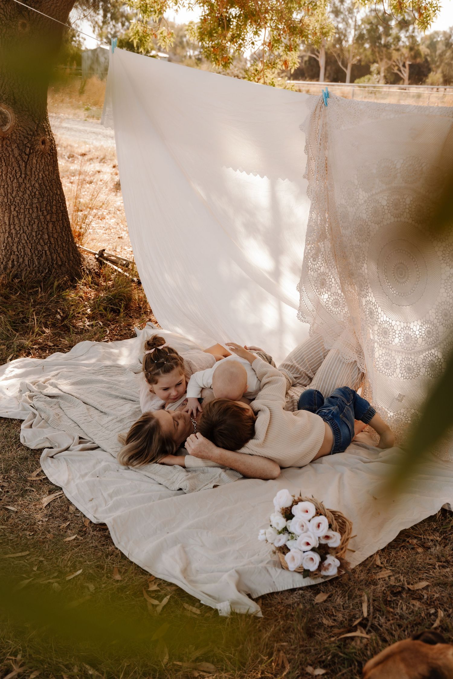 family-cuddling-on-blanket-lifestyle-session-tongala