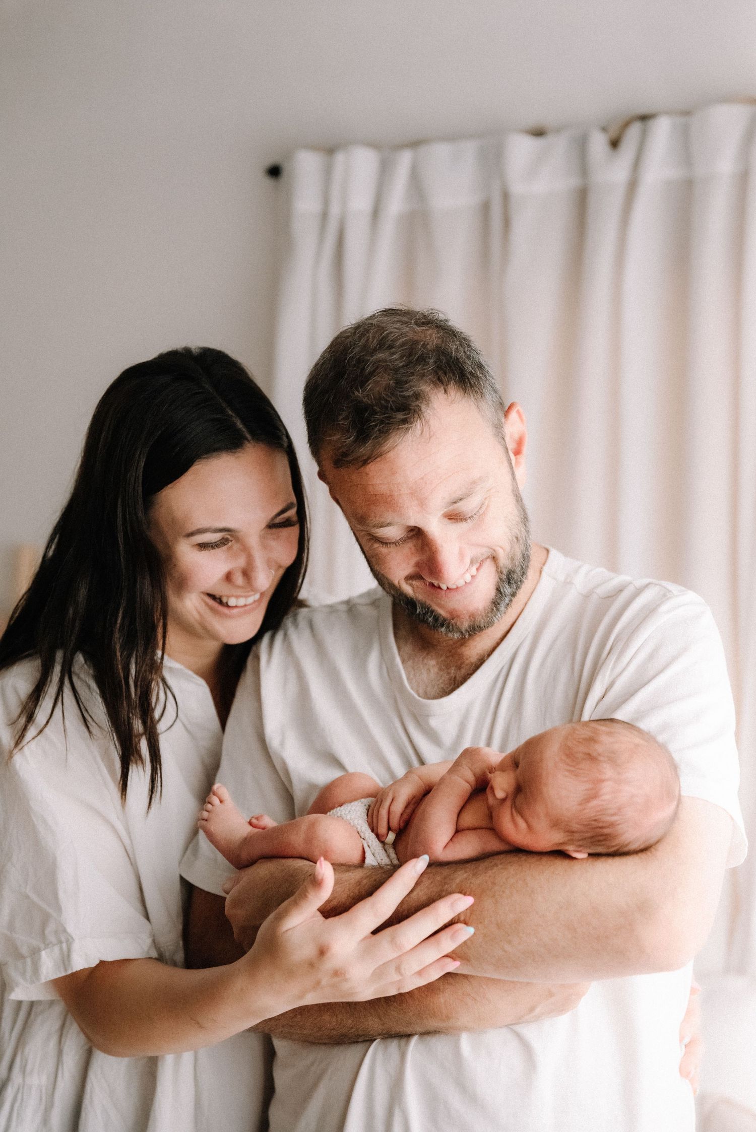 tongala-newborn-photography-newborn-baby-snuggled-with-parents