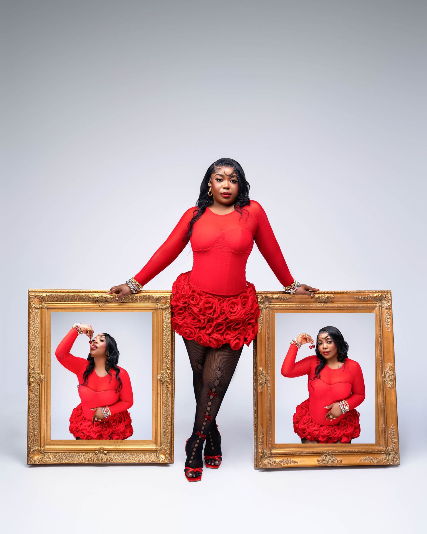Creative fashion portrait in red dress with gold frames creating artistic triptych effect.