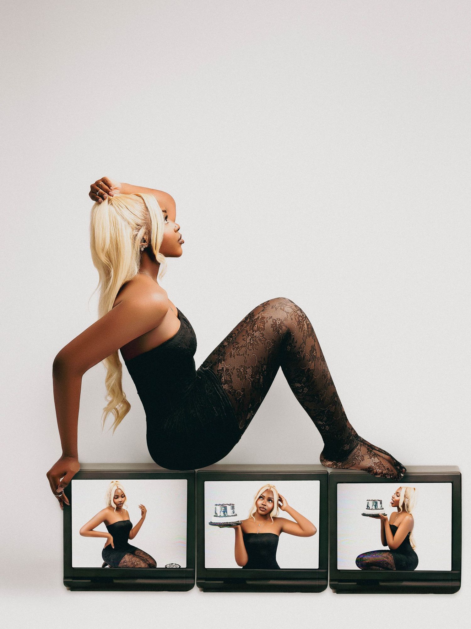 Artistic portrait series showing three poses on photo frames with black dress and lace details.