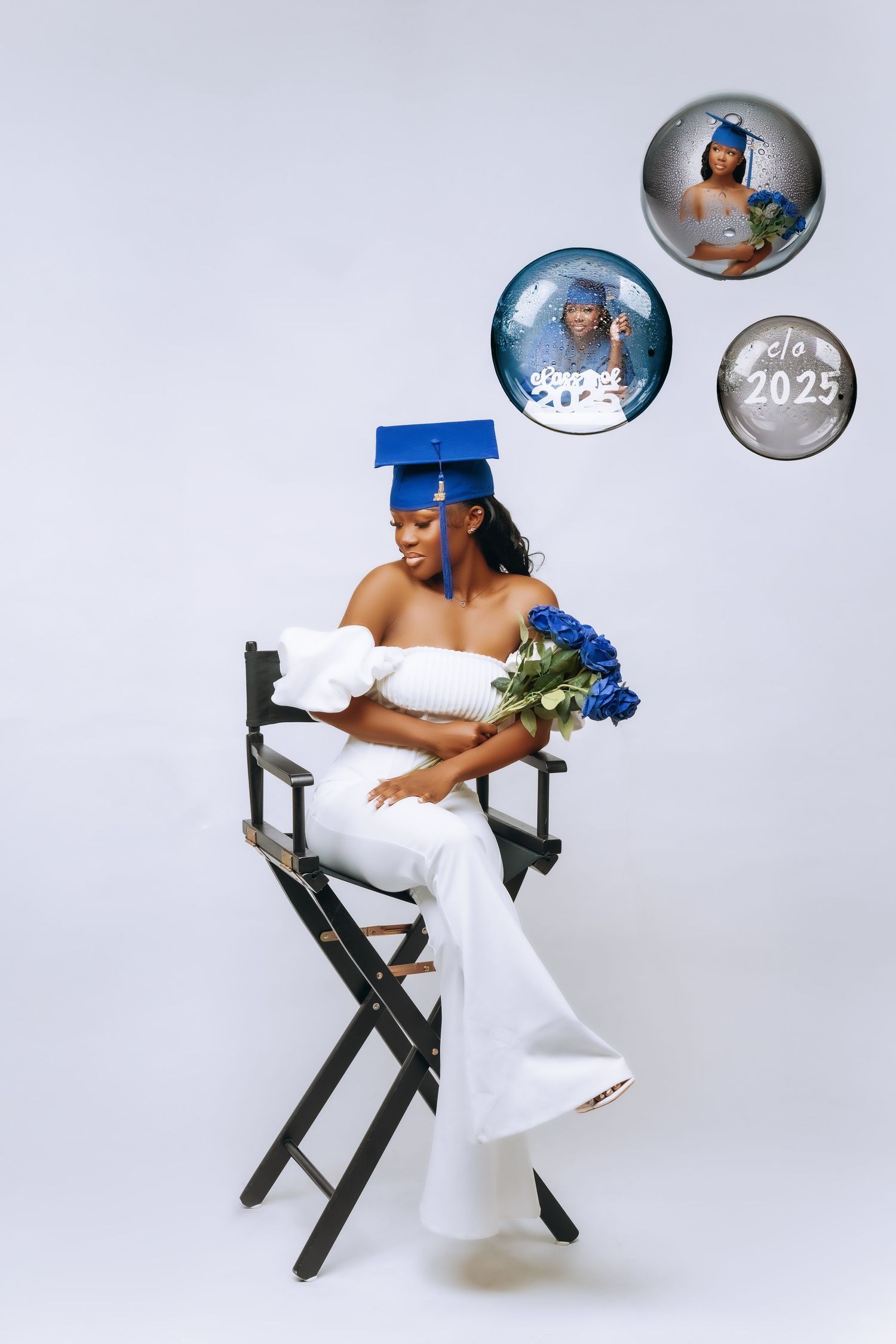 Graduation portrait with floating circular photo frames against white background.