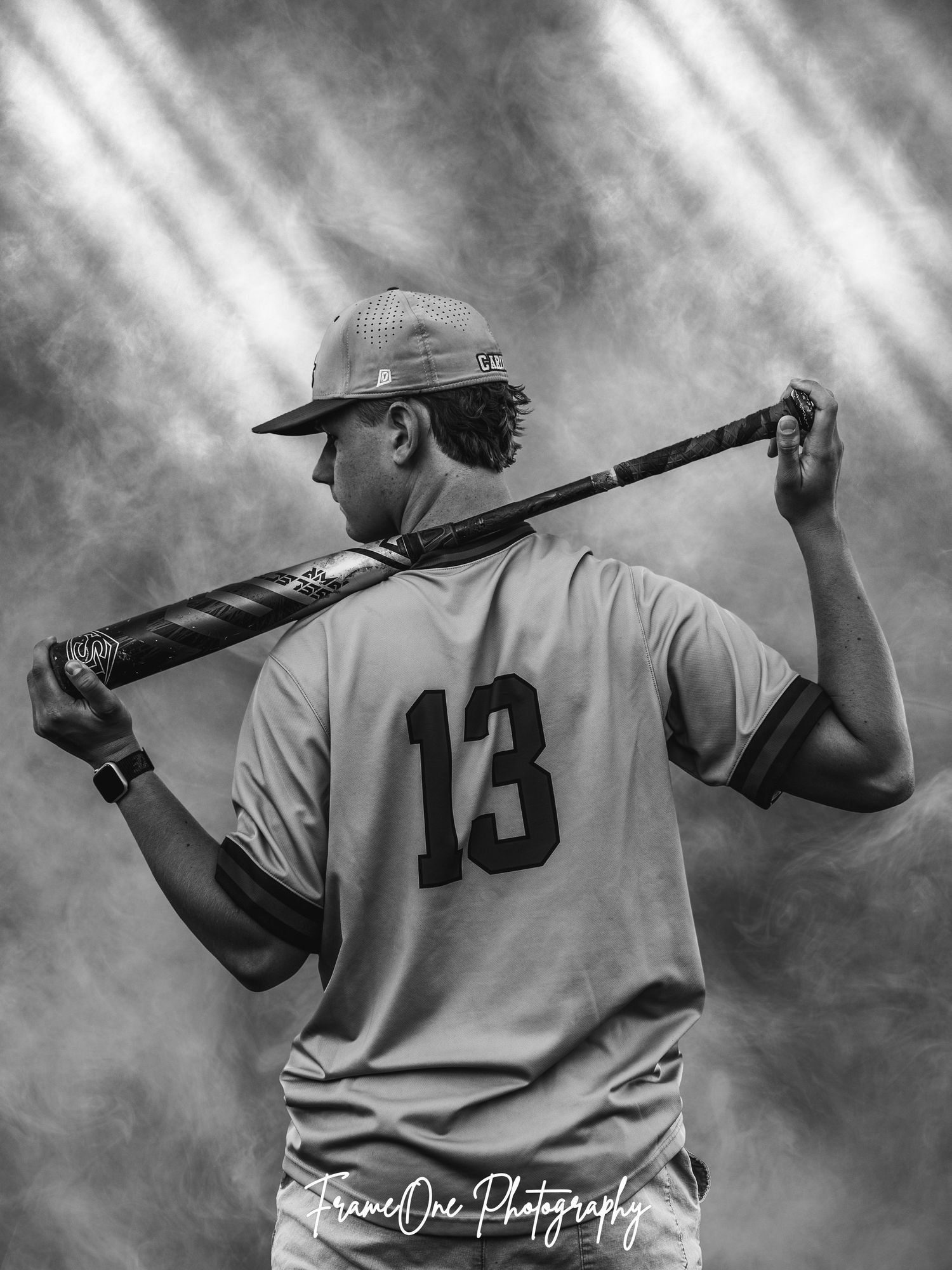 Black and white sequence showing a baseball player with jersey number 13 demonstrating batting stance and follow-through motion.