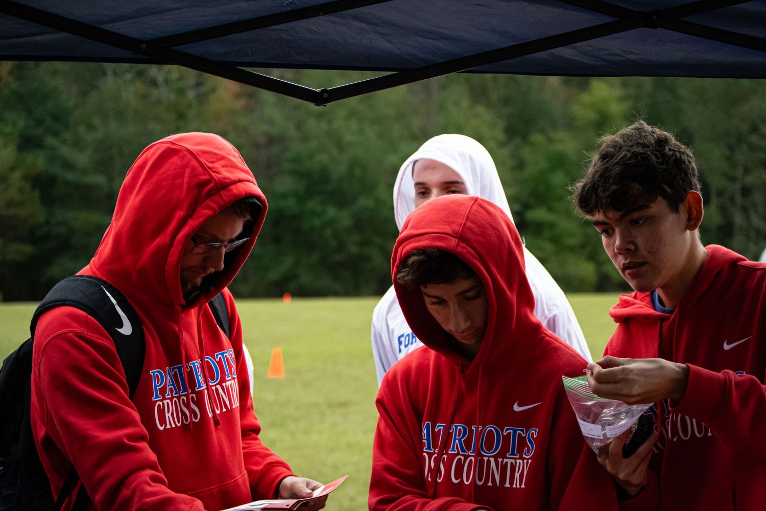 A photo of men planning their race plan