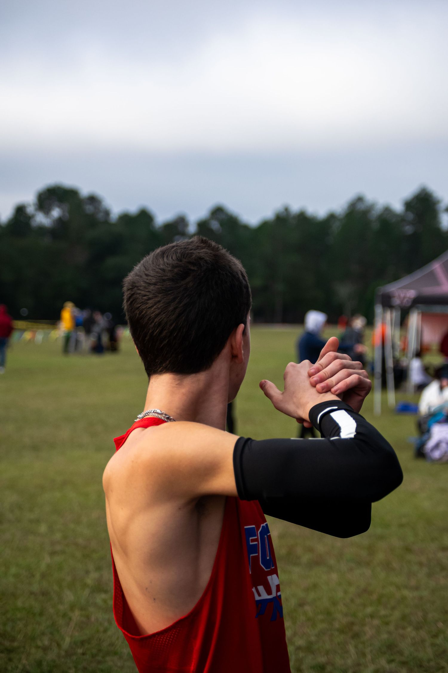 A photo of a man looking off into the distance