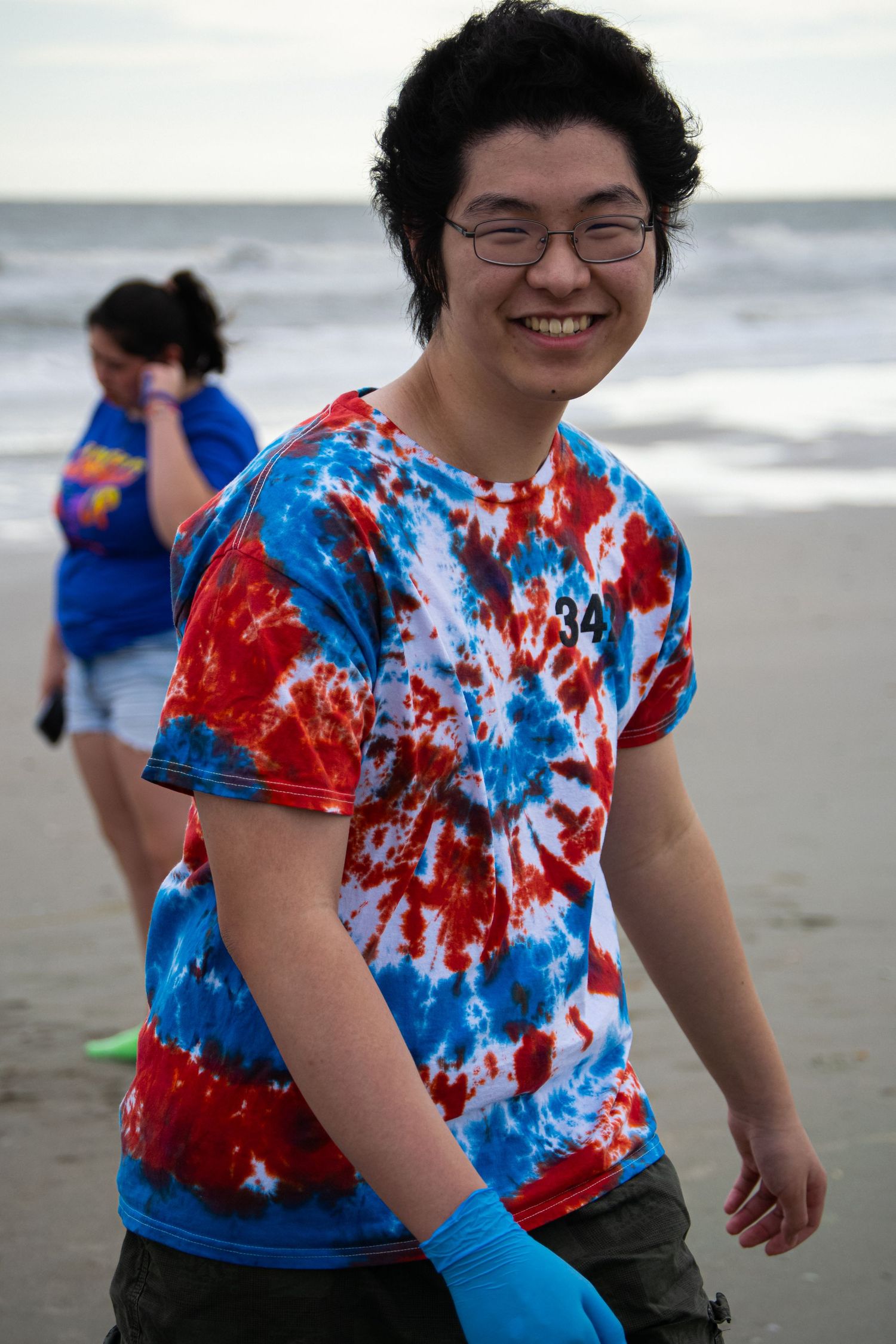 A man smiling at a beach