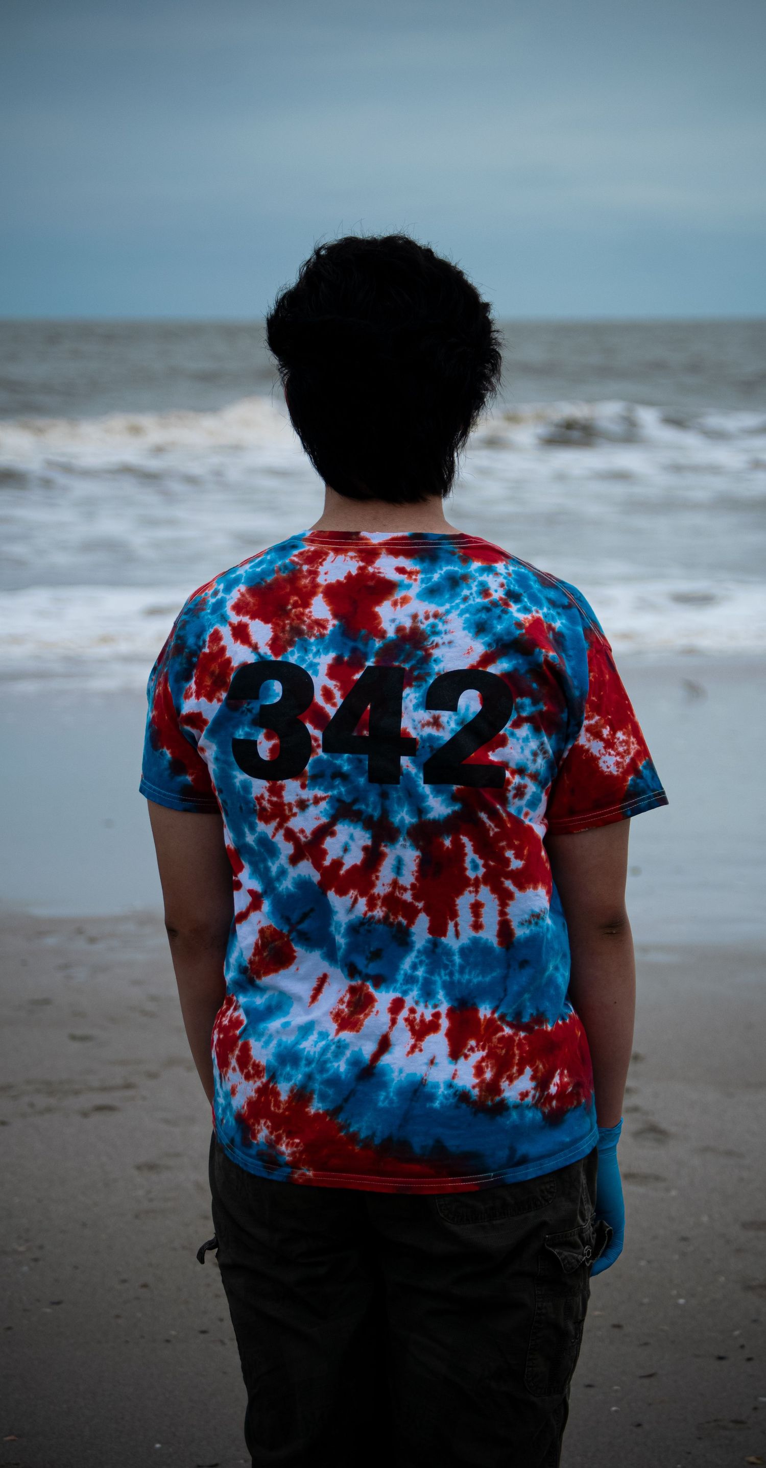 A man posing at a beach/ This Photo is also cover picture for the Services page