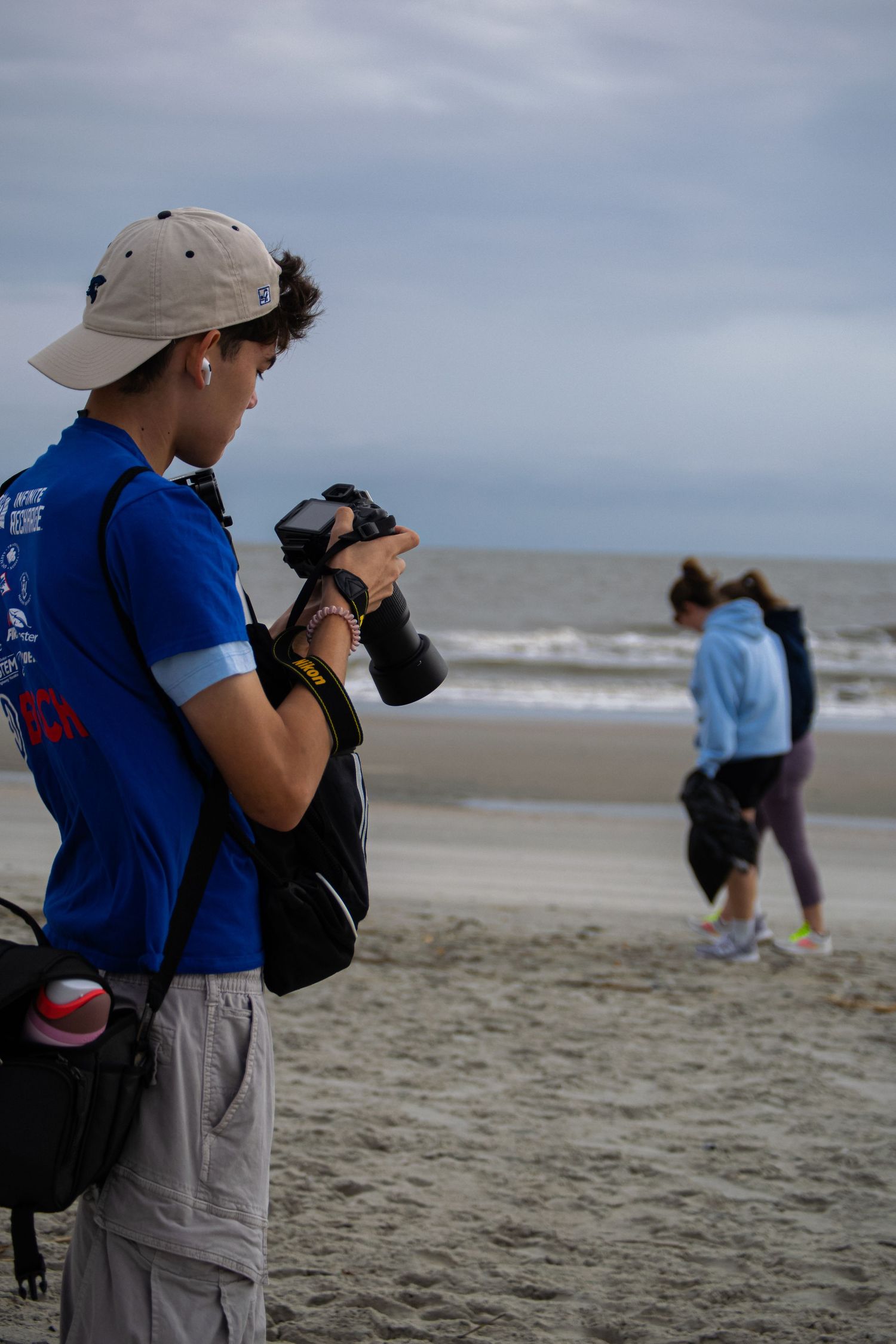 A photographer looking into his camera