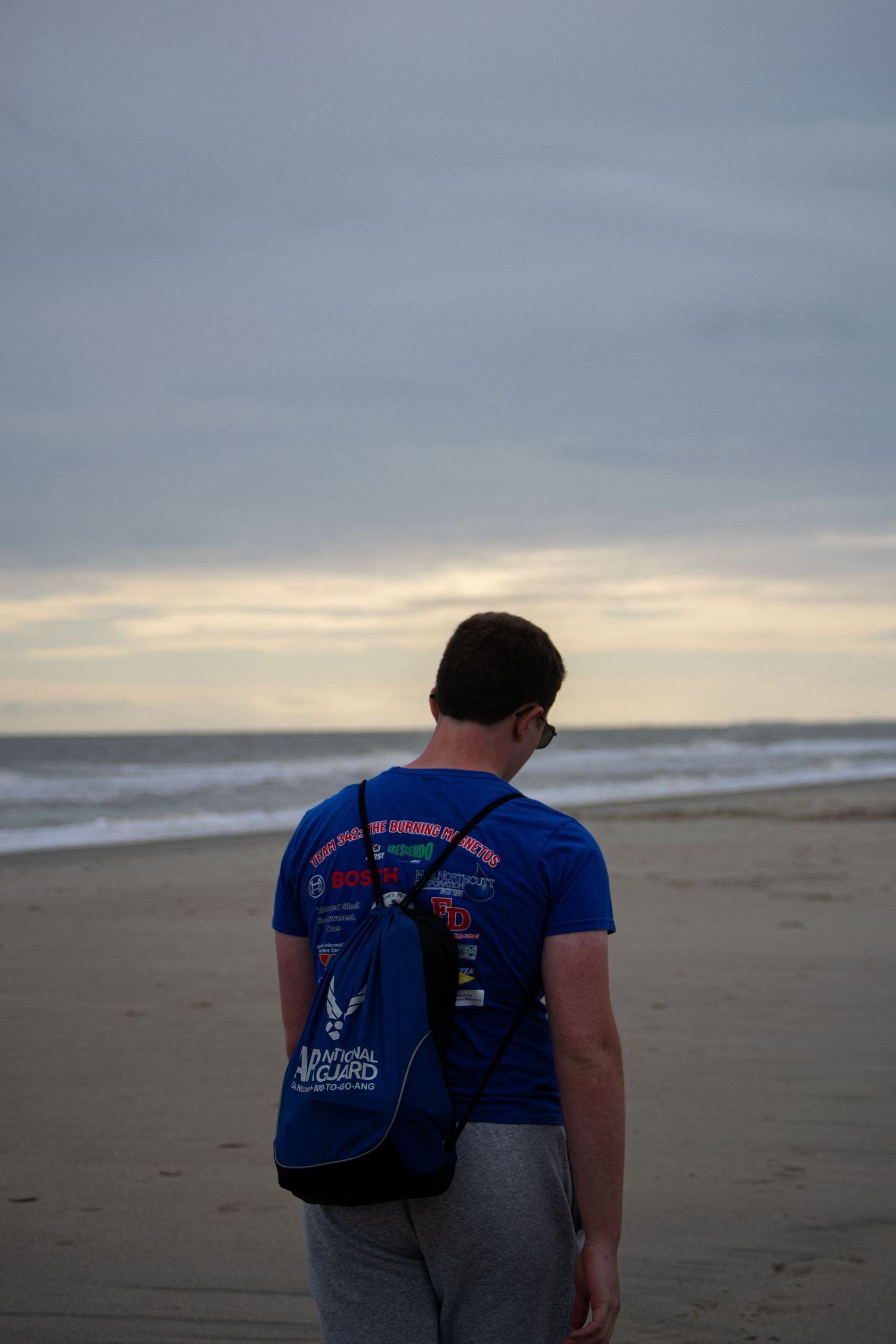 A man walking on a beach
