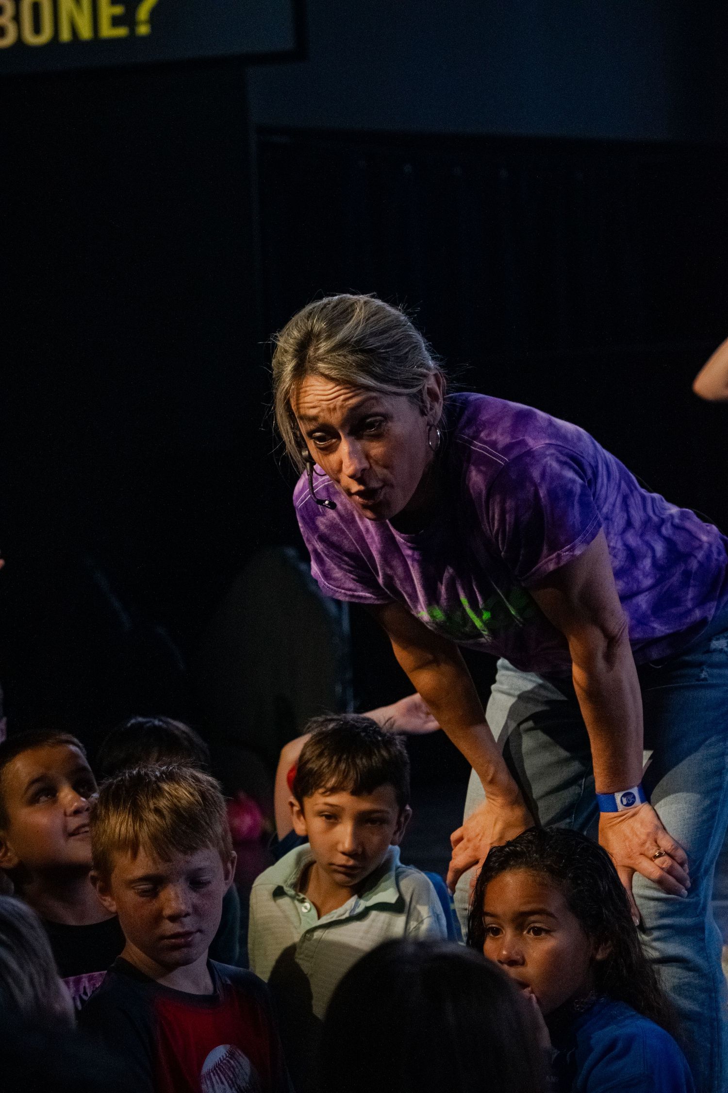 A woman interacting with children