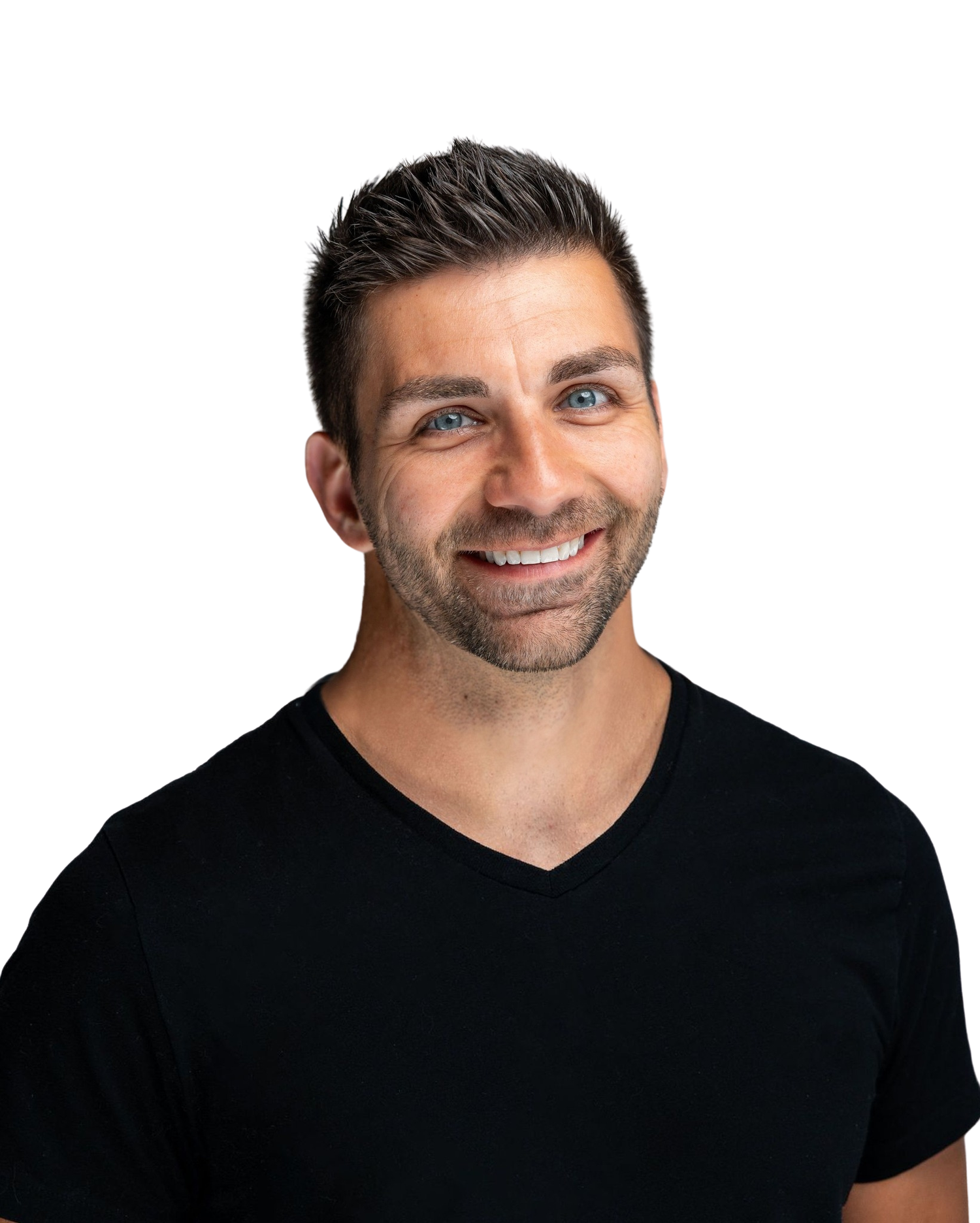 A person wearing a black v-neck t-shirt smiles warmly against a dark background.