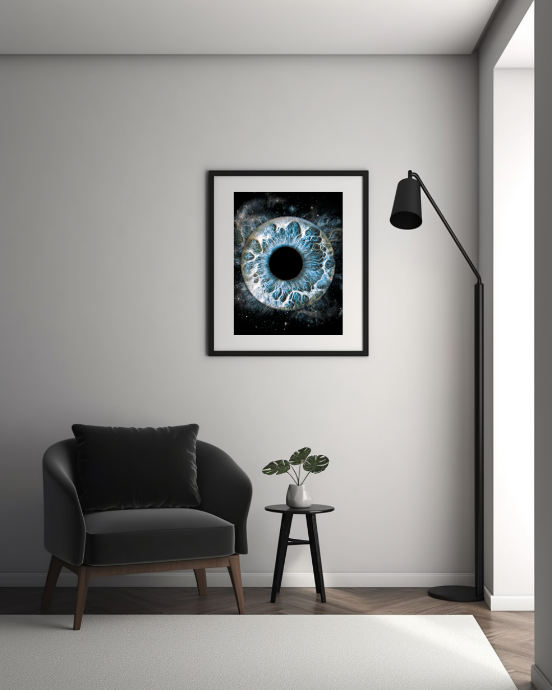 Modern interior design with a gray armchair, black floor lamp, and striking blue iris artwork framed on a white wall.