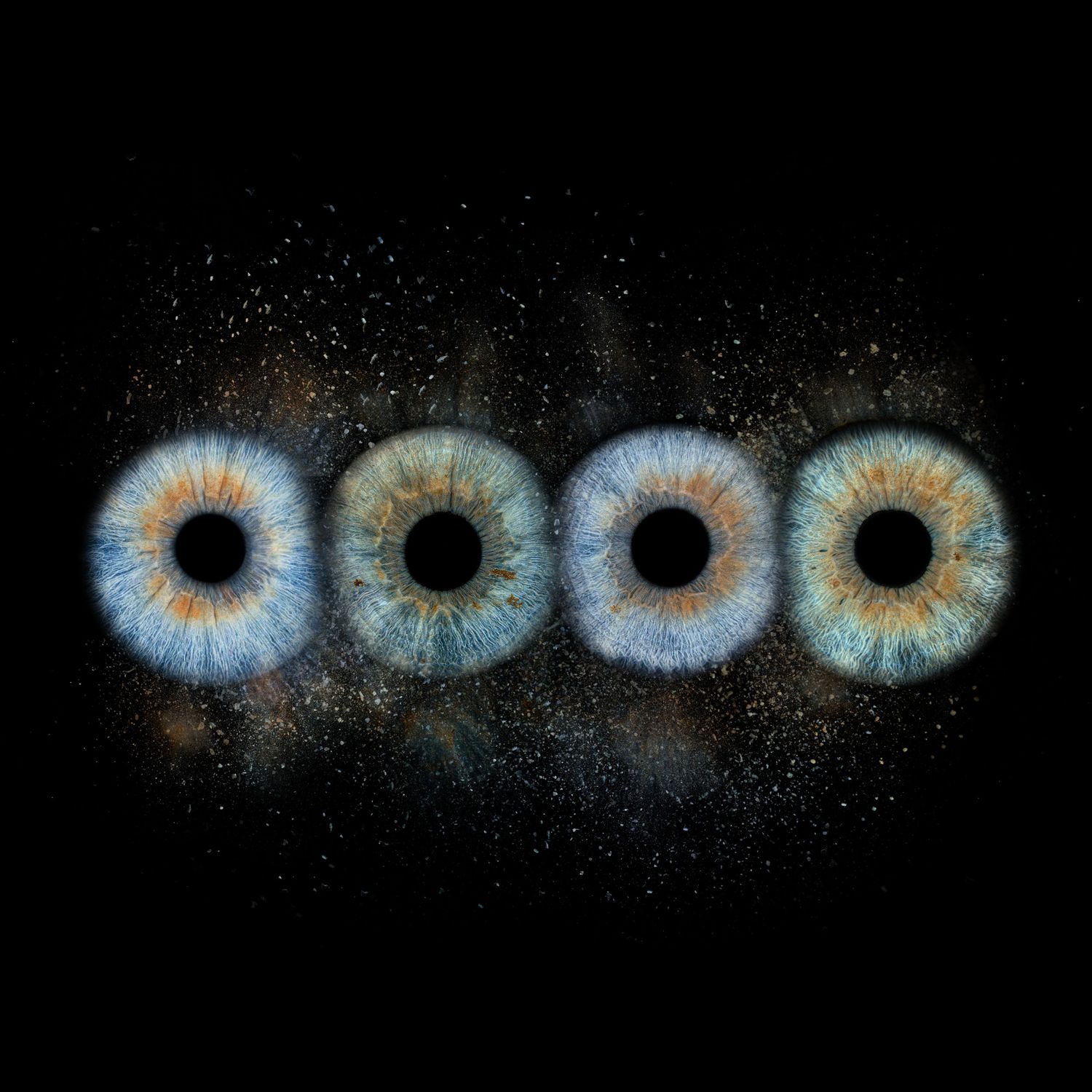 A sequence of cosmic iris-like shapes with glowing blue and orange rings radiating outward against a black background.