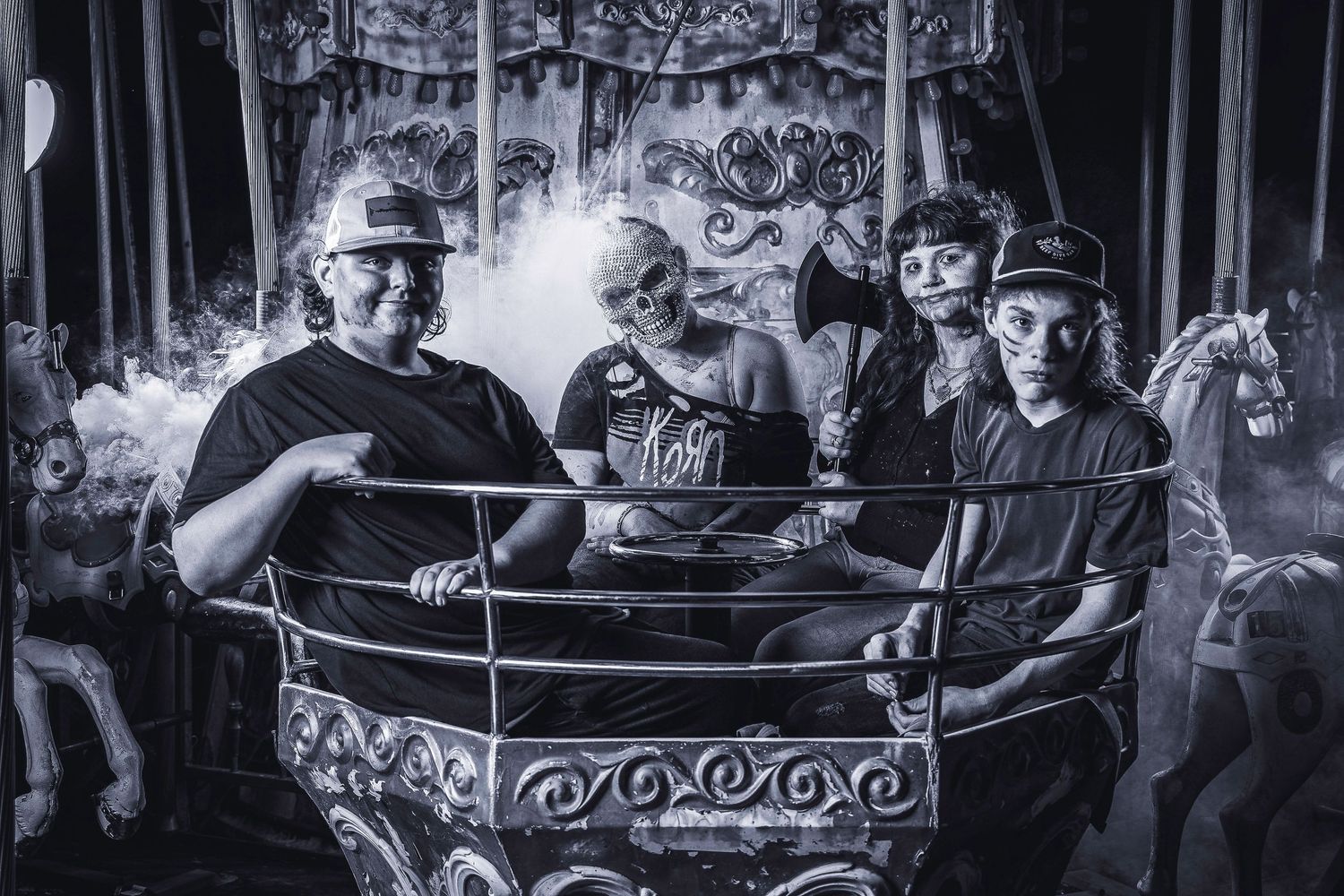 Black and white carousel photos show people enjoying amusement park rides at night with motion blur effects.