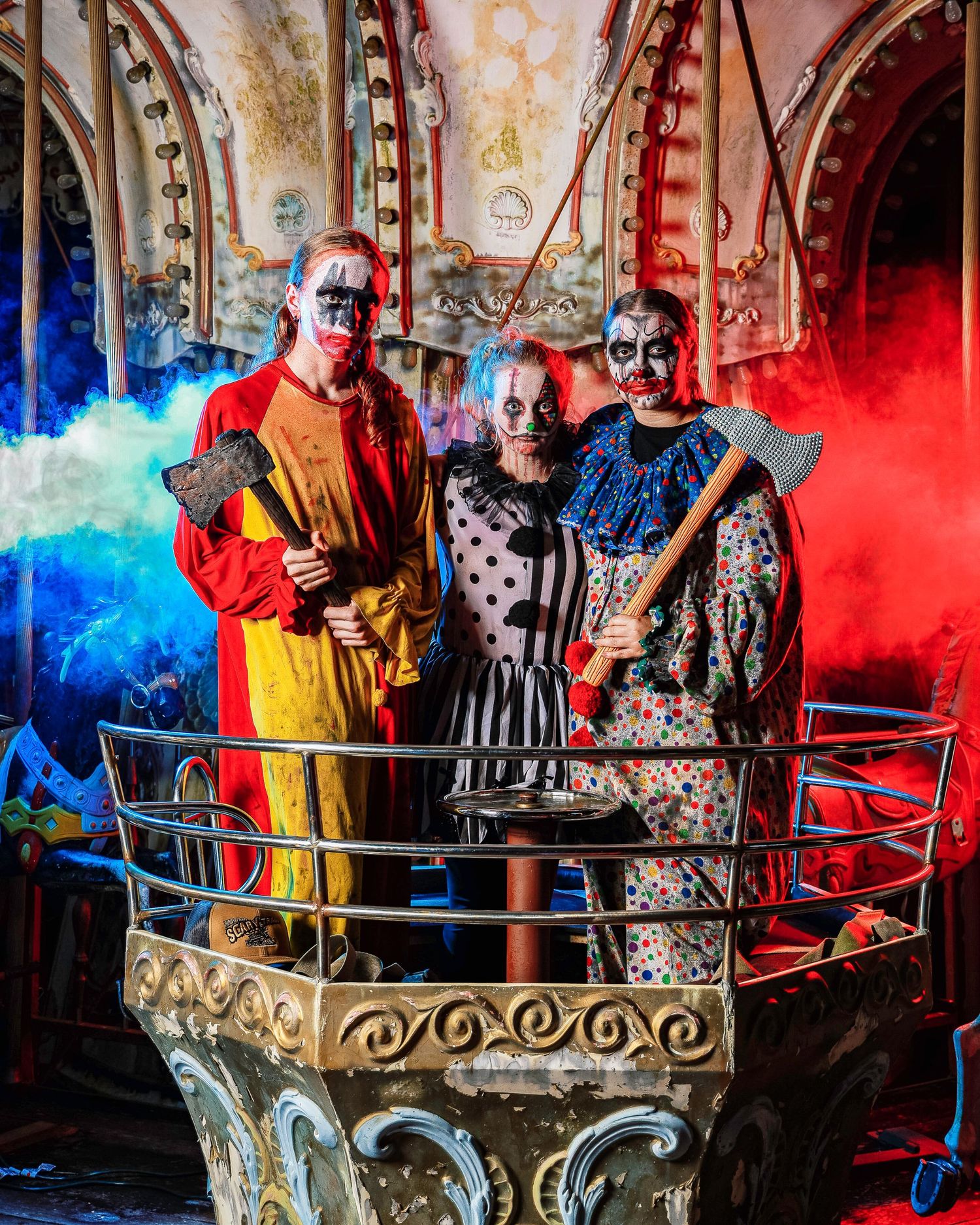 Dramatic photo series showing figures in a stylized boat prop against colorful smoke effects and theatrical lighting.