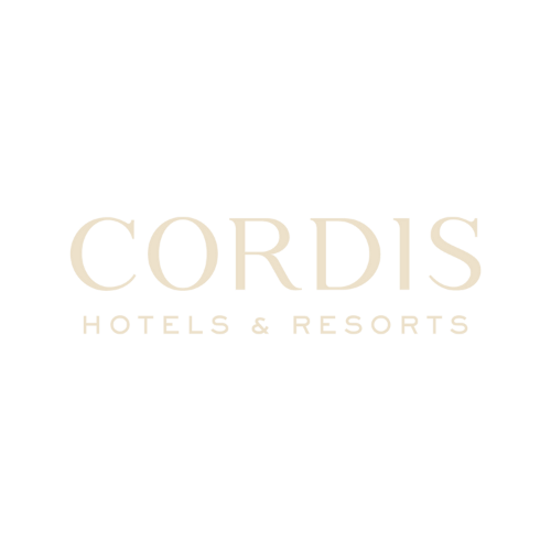 Cordis Hotels & Resorts elegant text logo in cream color.