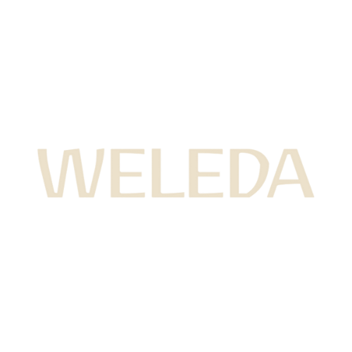 Weleda brand logo text in light beige color on white background.