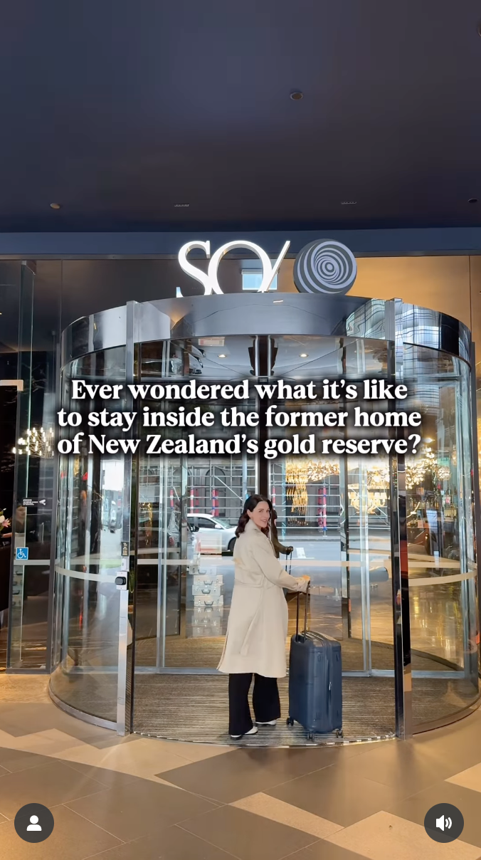 Rachael Ferguson UGC SO/Auckland hotel entrance featuring illuminated sign and revolving glass door.