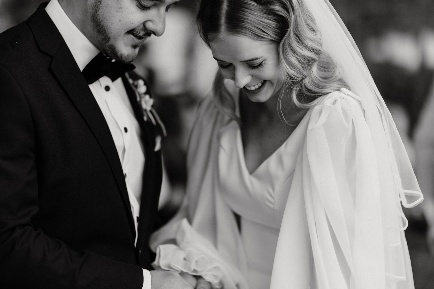 Intimate wedding day moments captured in a romantic black and white style.