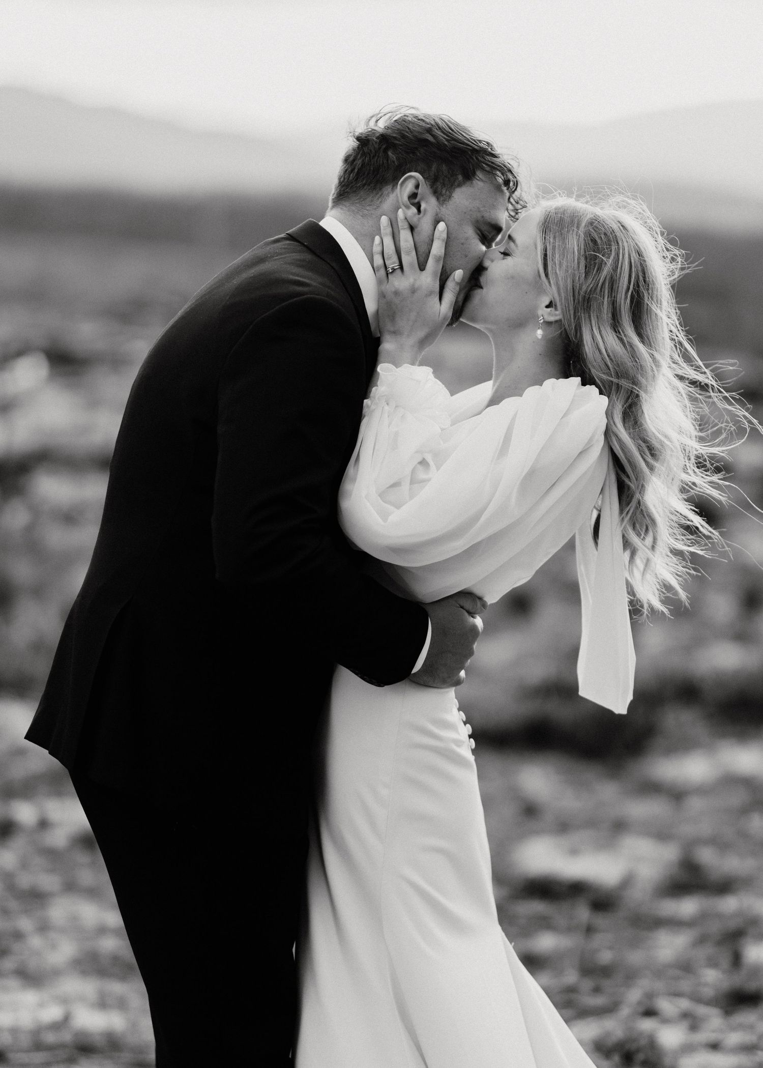 Series of romantic wedding poses captured in desert landscape at sunset.