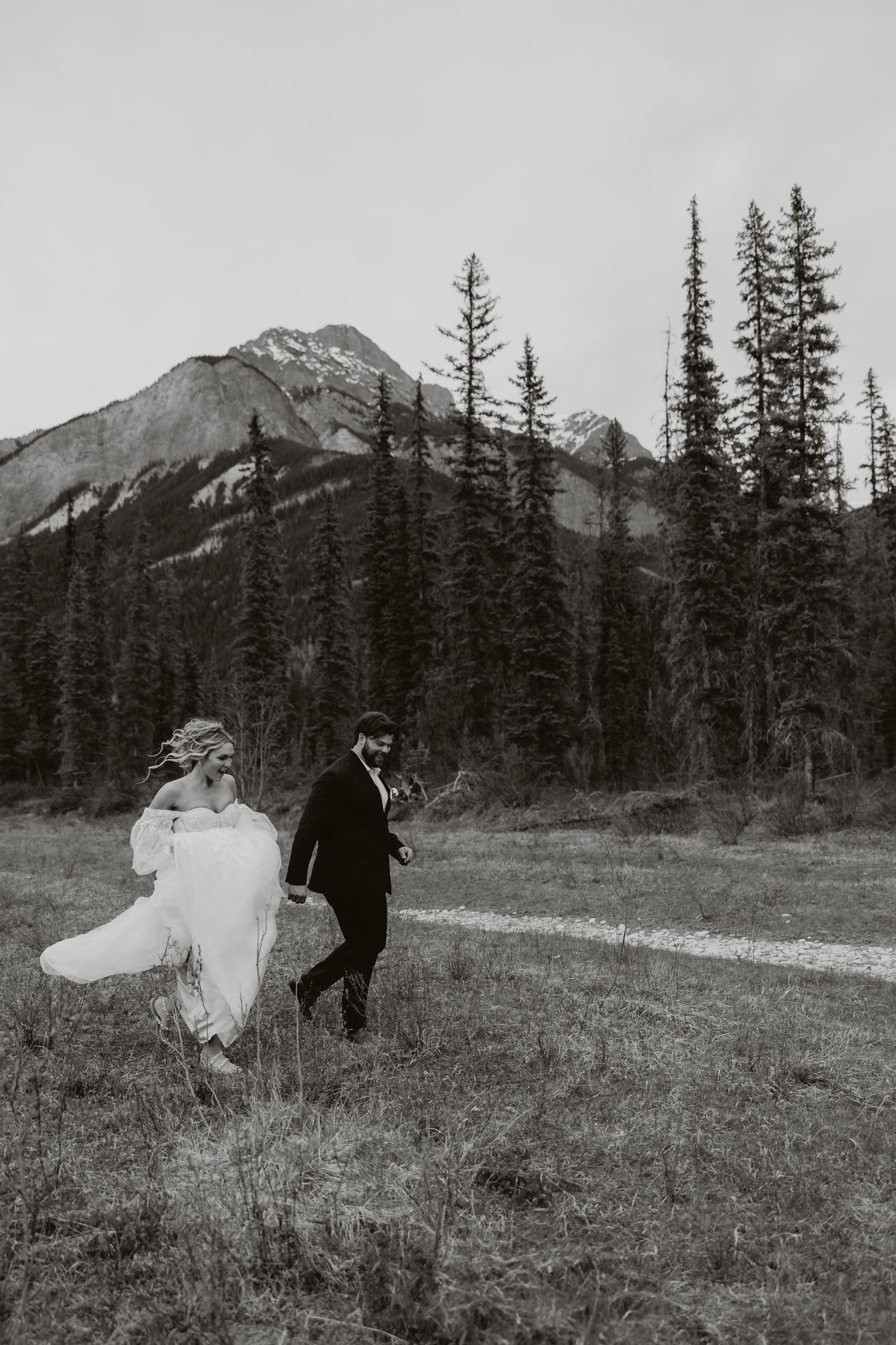 Candid documentary-style wedding photography in Banff and Calgary capturing genuine, unscripted moments with a soft western Aspen Allison