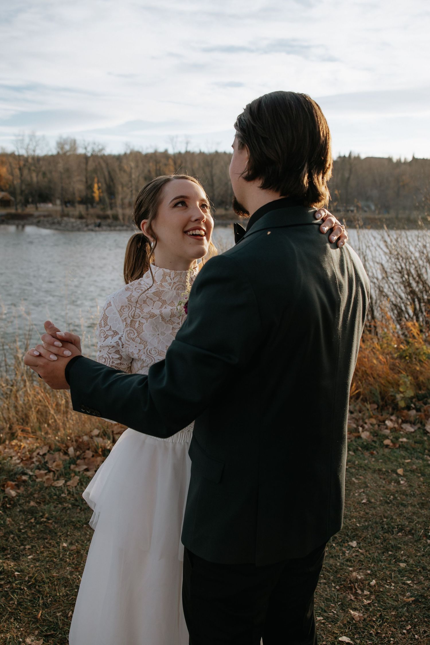 Candid documentary-style wedding photography in Banff and Calgary capturing genuine, unscripted moments with a soft western Aspen Allison