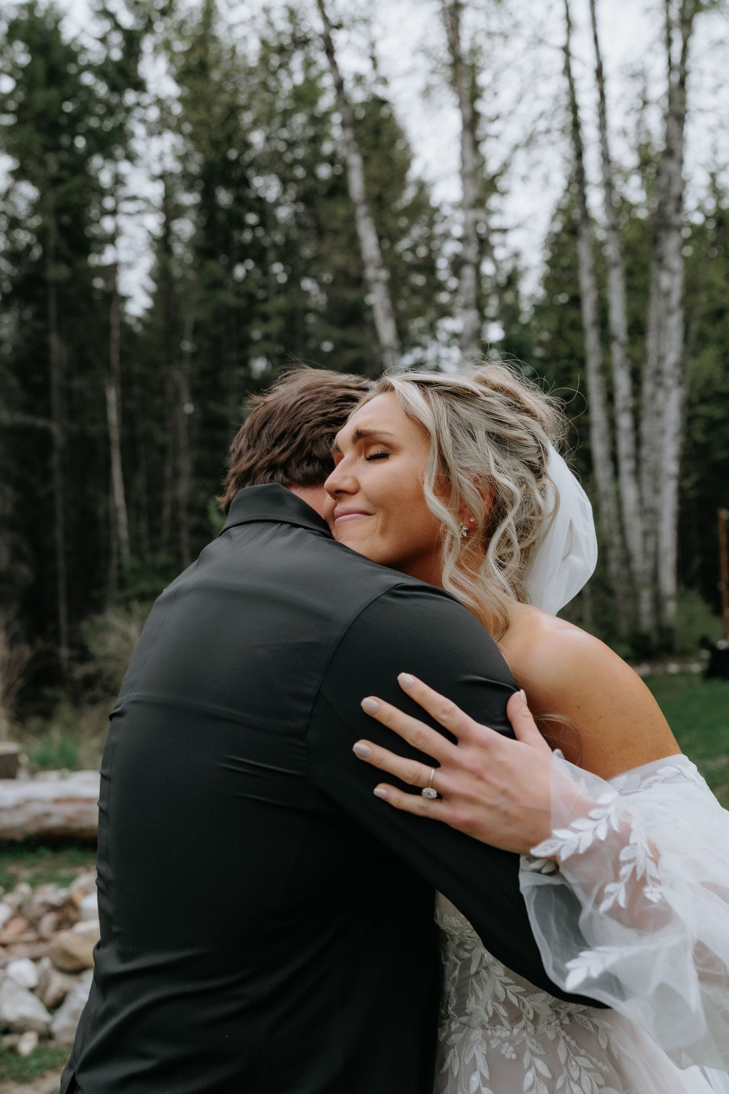 Candid documentary-style wedding photography in Banff and Calgary capturing genuine, unscripted moments with a soft western Aspen Allison