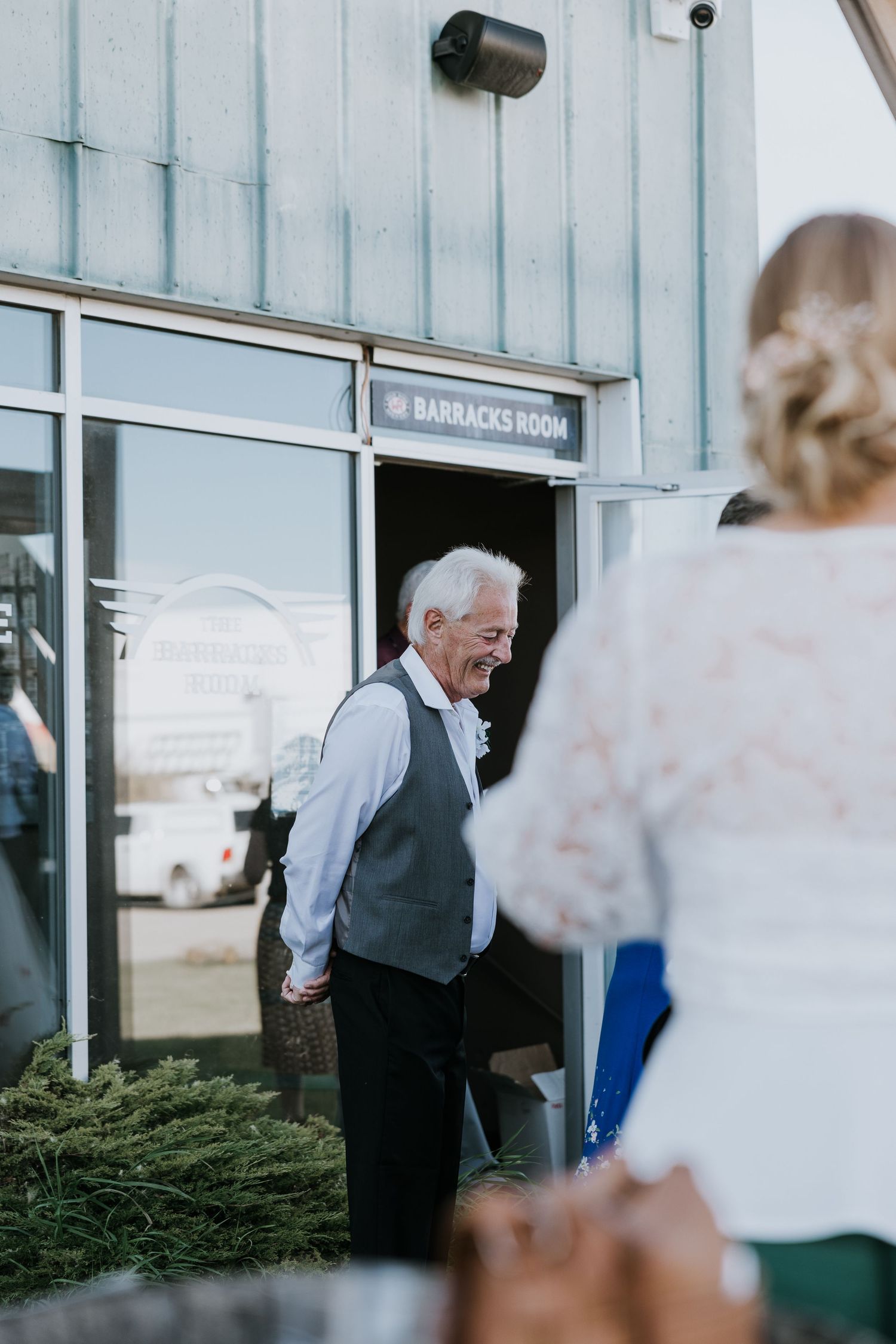 Candid documentary-style wedding photography in Banff and Calgary capturing genuine, unscripted moments with a soft western touch against mo