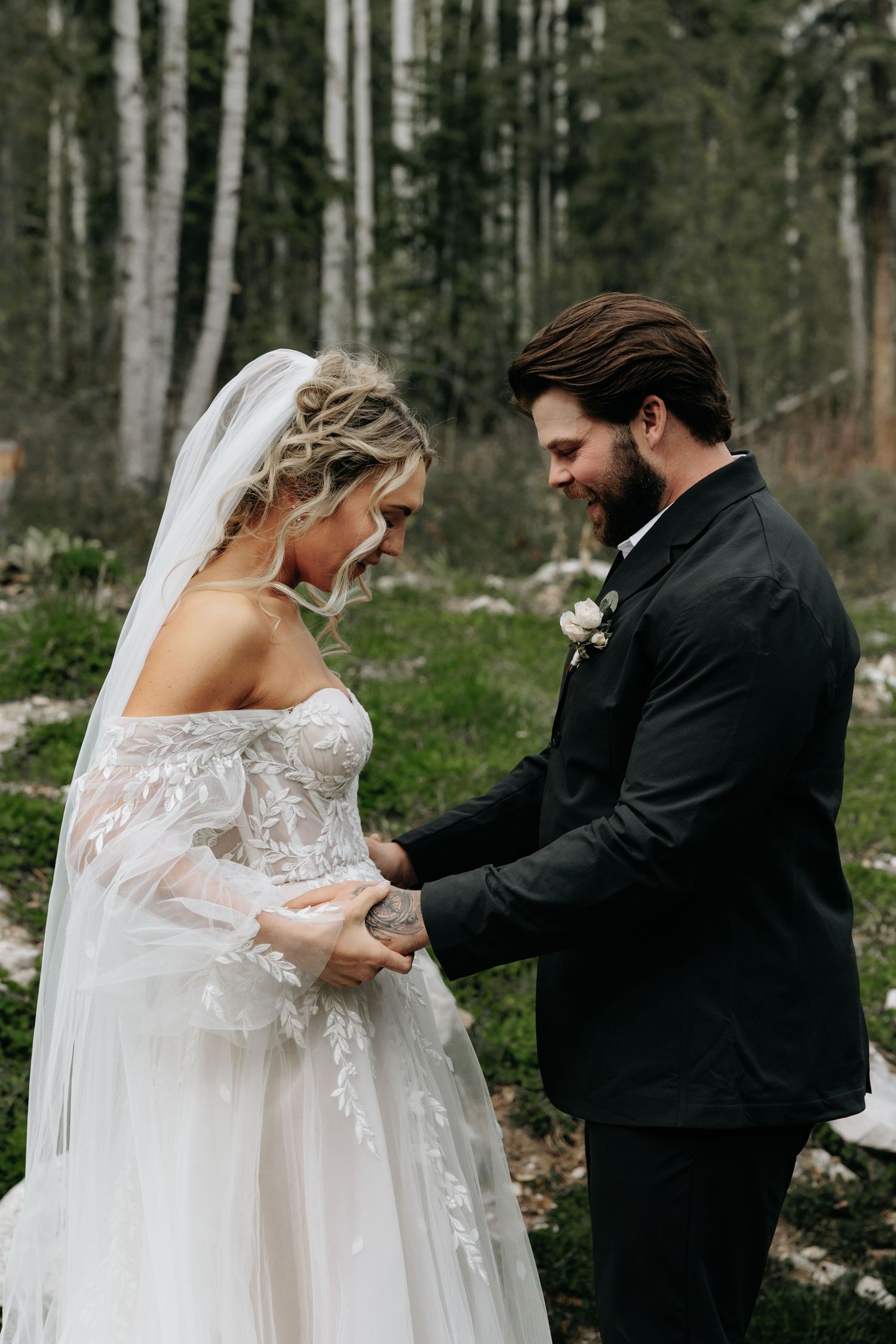Banff mountain couples session photographed in a candid, documentary style with warm western elements woven into the imagery.
