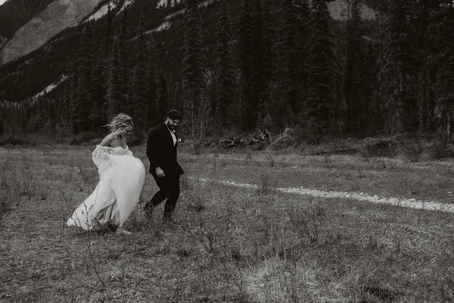 Candid documentary-style wedding photography in Banff and Calgary capturing genuine, unscripted moments with a soft western Aspen Allison