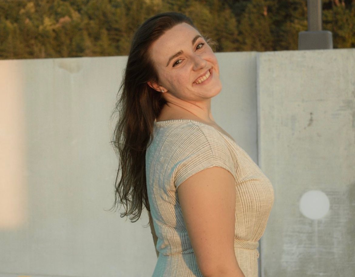 a portrait of a woman in the sunlight