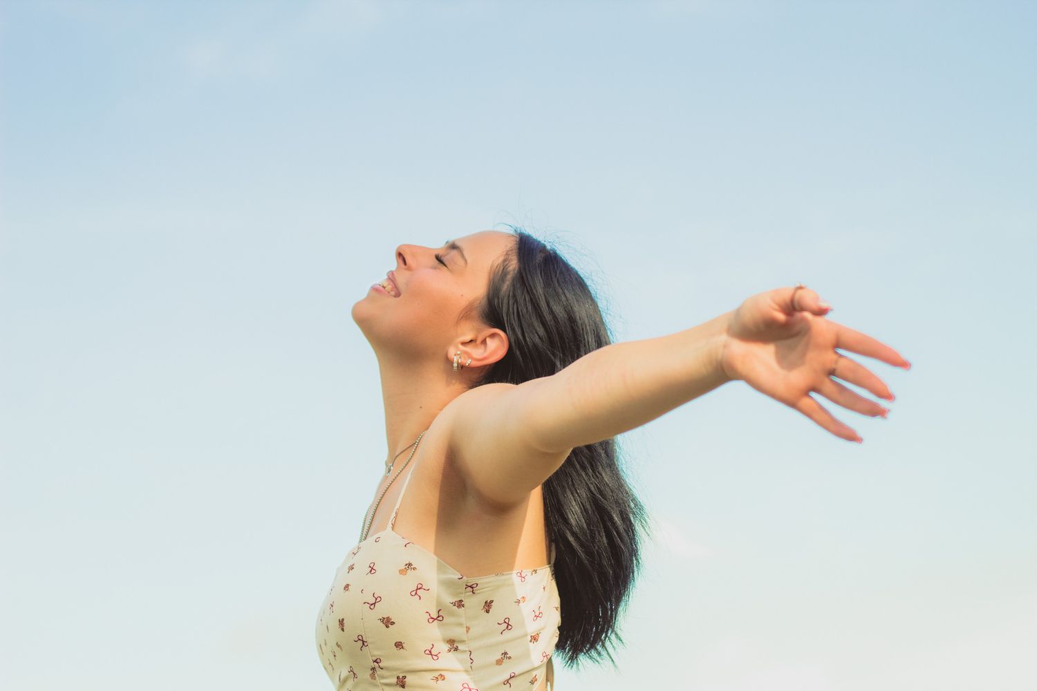 portrait of a young woman basking in the sun