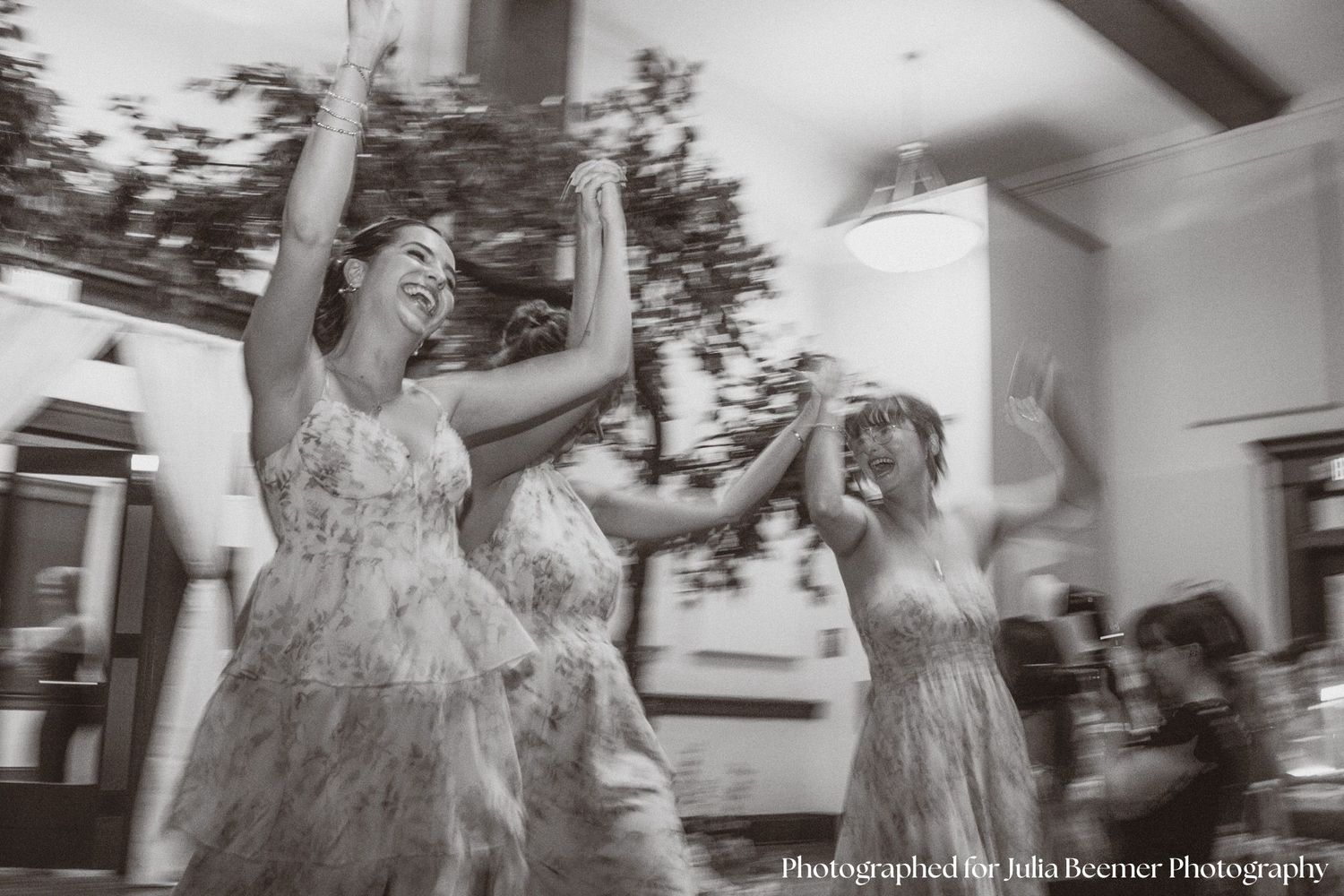 a photo a bridesmaids joyfully entering a reception