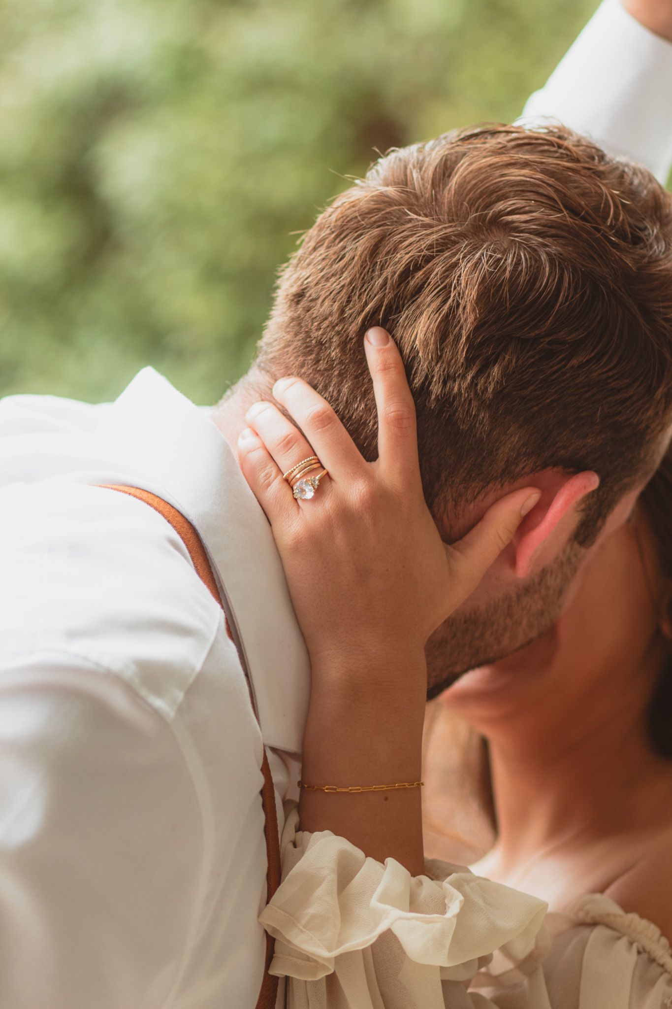 portrait of man kissing a woman