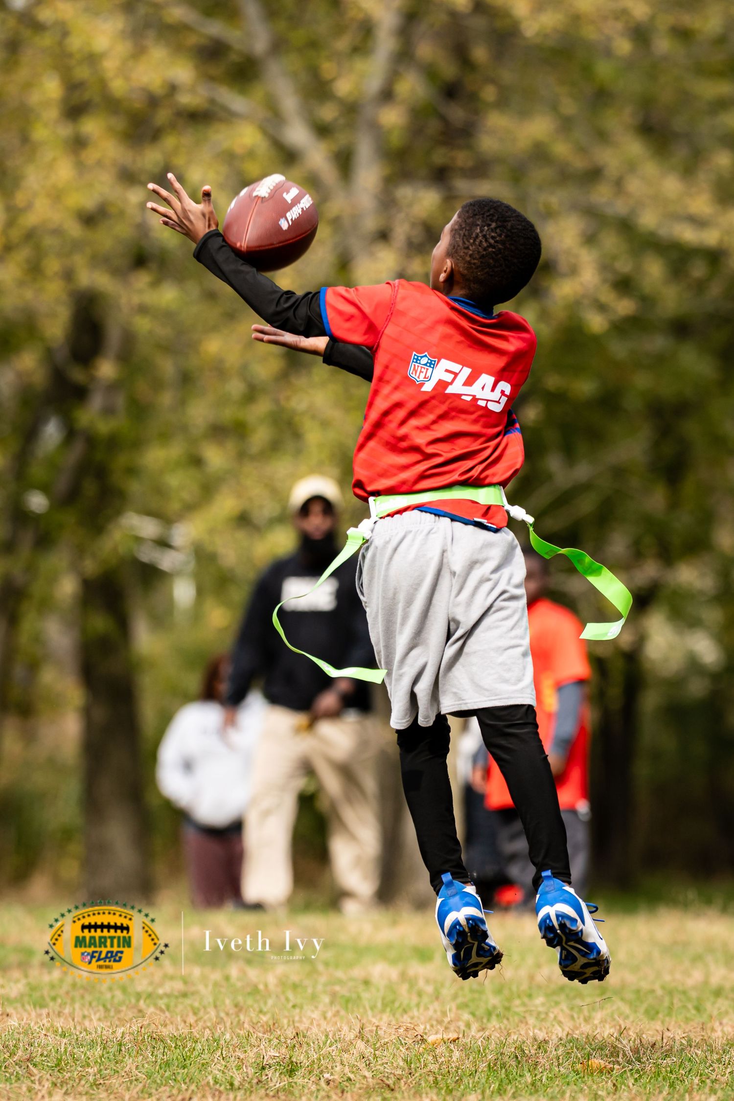 A sequence of four action shots showing a flag football player diving to make a dramatic catch in an outdoor field.