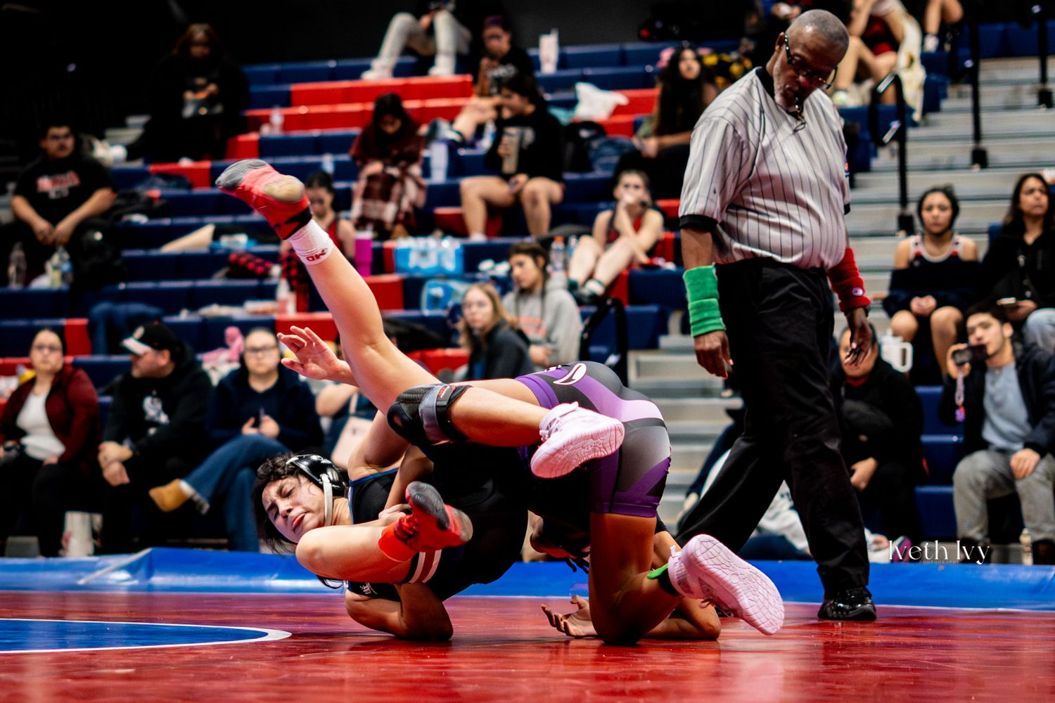 Multiple frames showing wrestling competition moves and techniques performed on blue and red mats.
