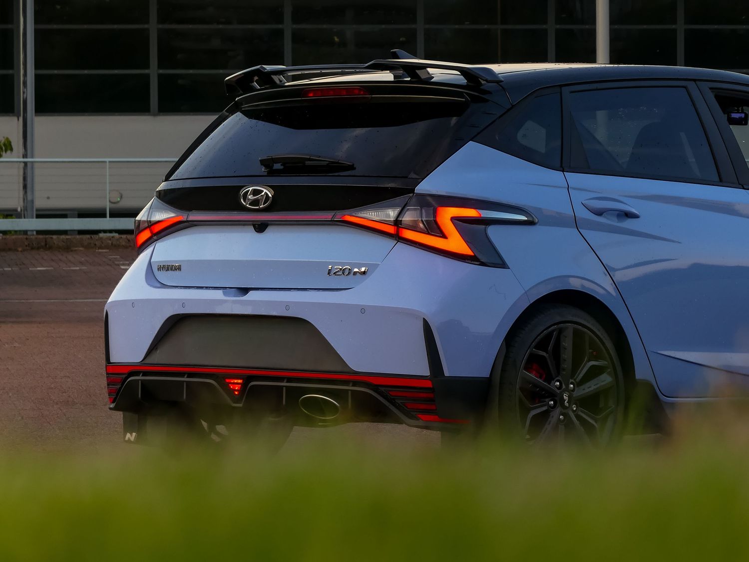 Close up rear view of a modern Hyundai Kona N Line showing distinctive angular taillights and sporty design elements.