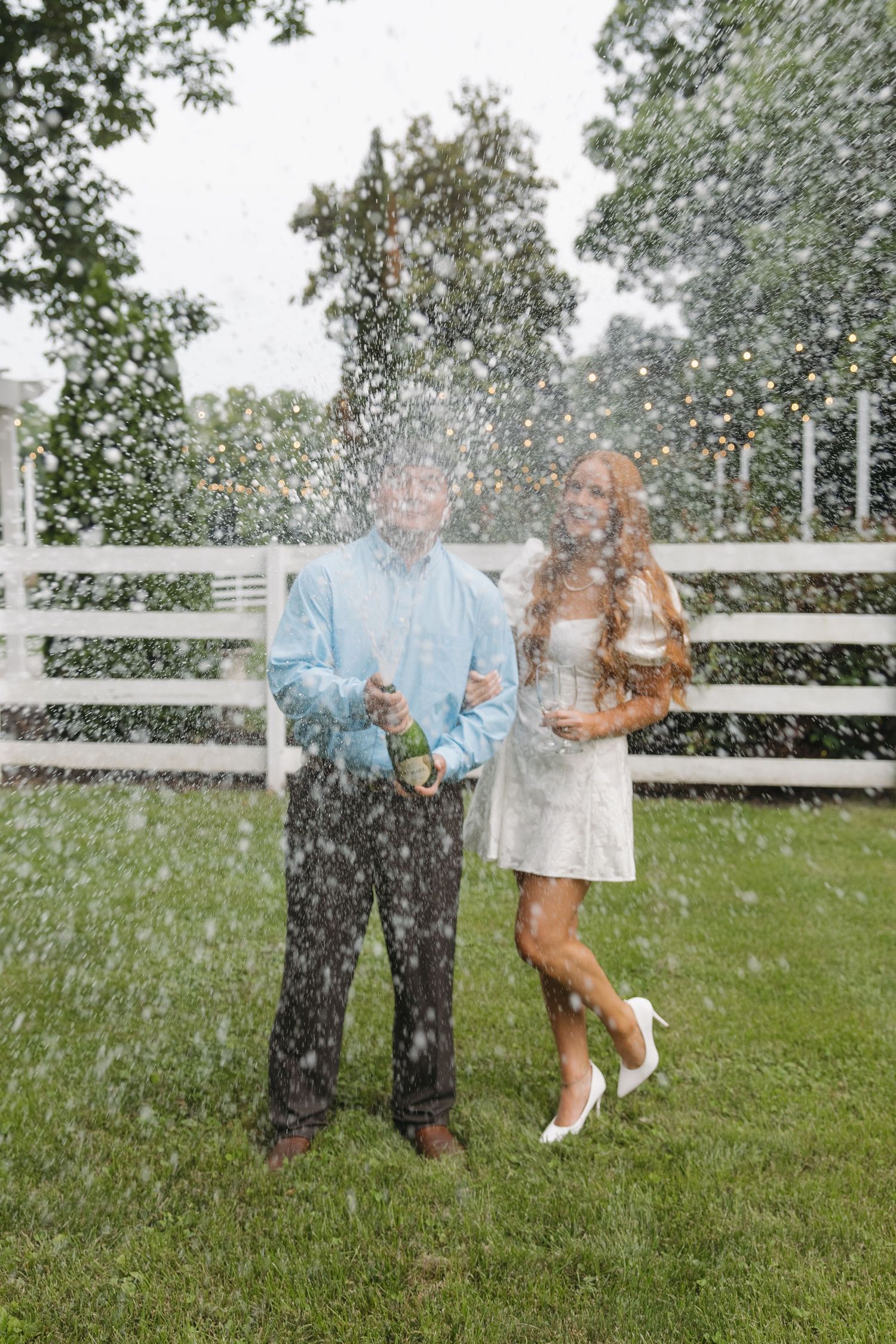 champagne pop documentary style engagement photos in North Carolina